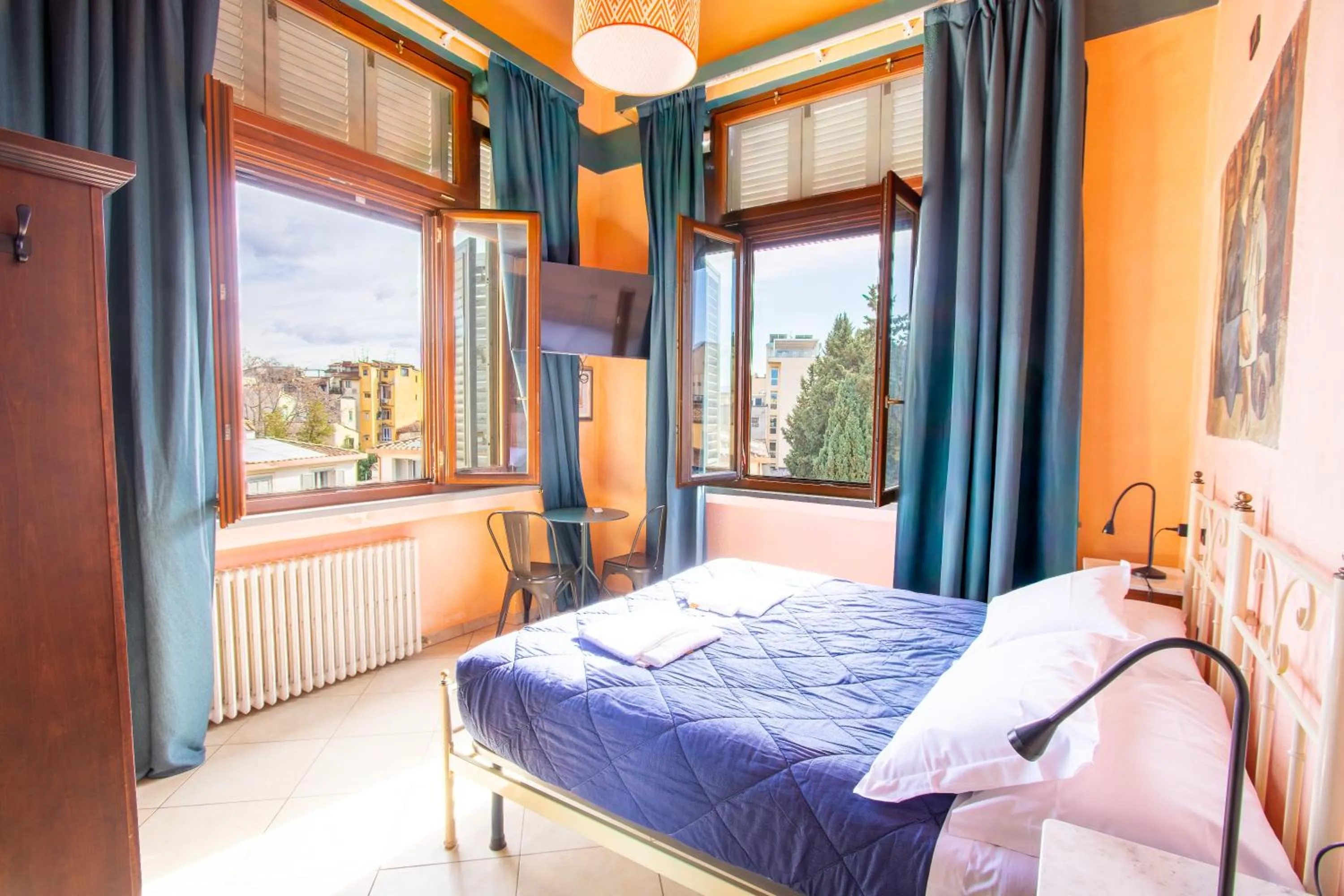 Bed in Hotel Merlini