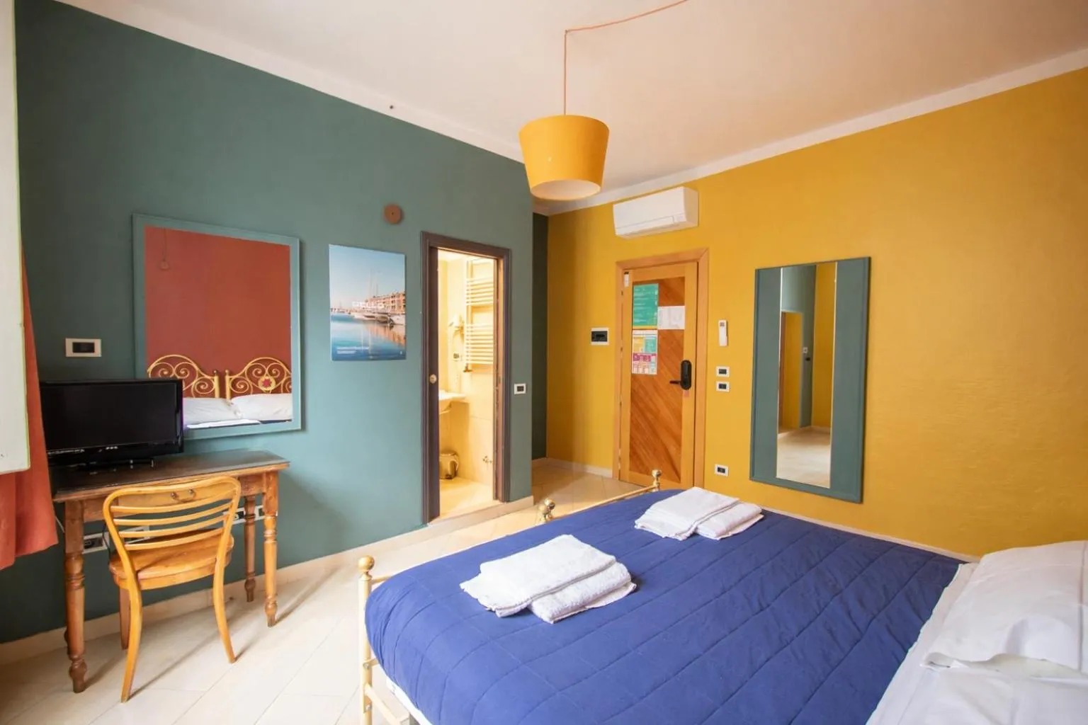 Bed in Hotel Merlini