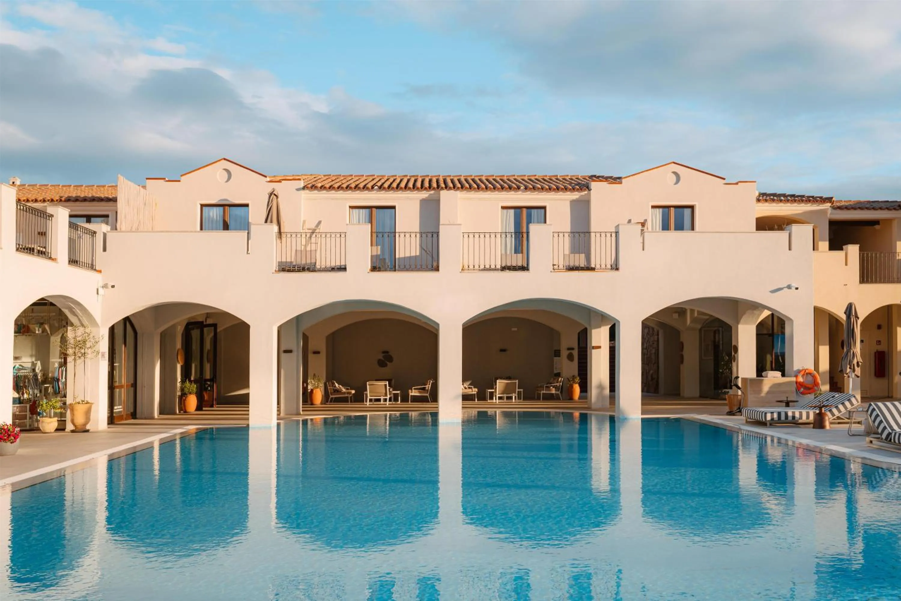 Pool view in Mangia's Santa Teresa Sardinia, Curio Collection by Hilton