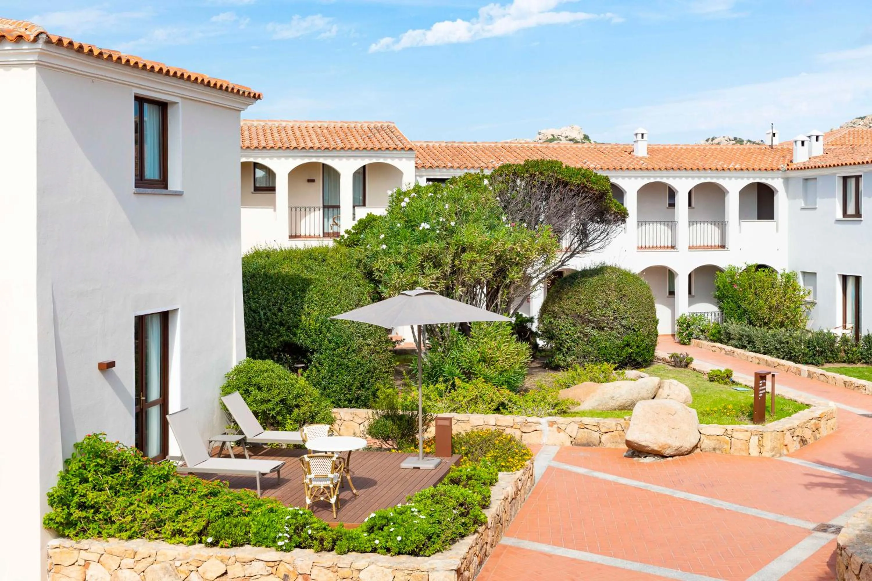 Property building in Mangia's Santa Teresa Sardinia, Curio Collection by Hilton