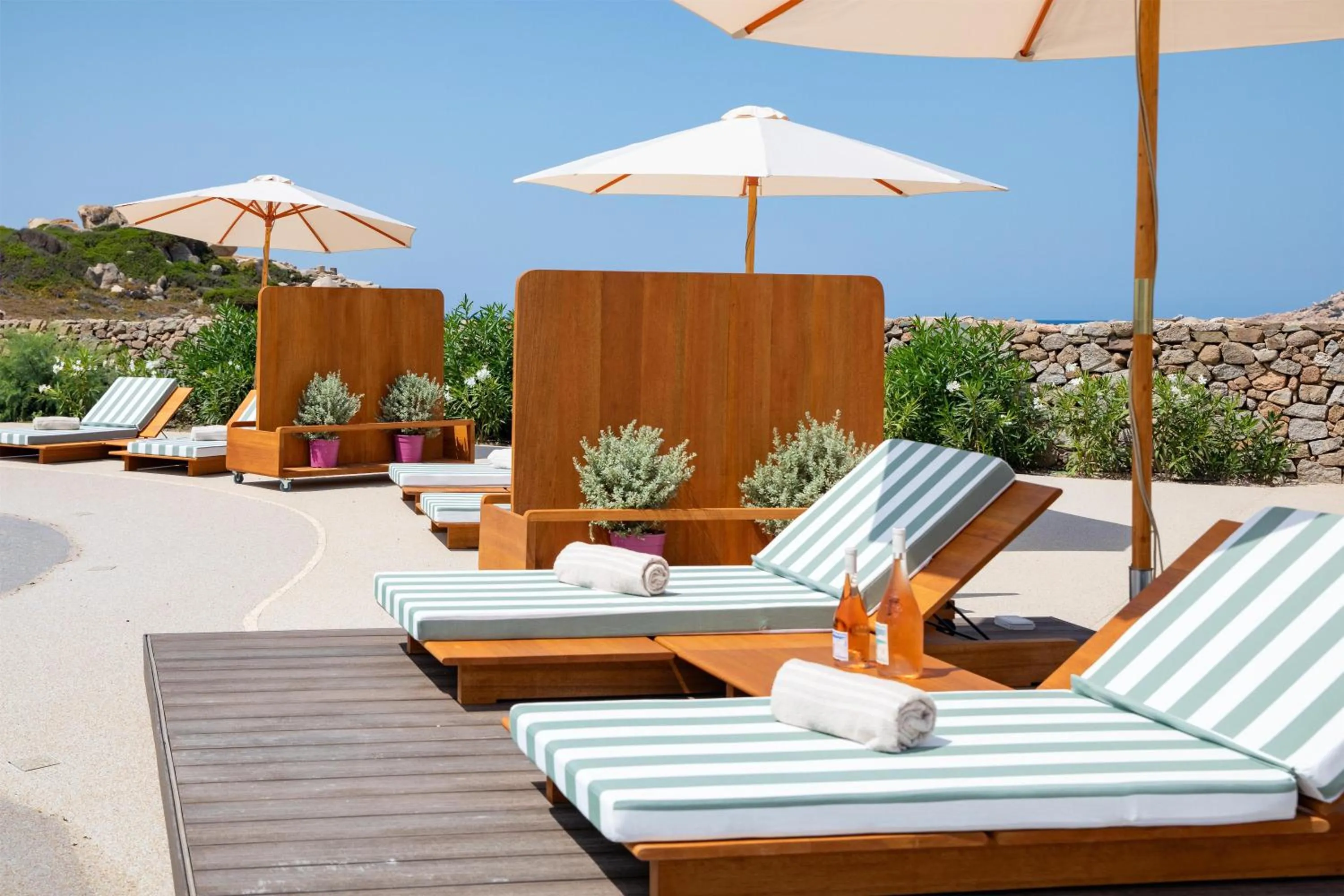 Pool view in Mangia's Santa Teresa Sardinia, Curio Collection by Hilton