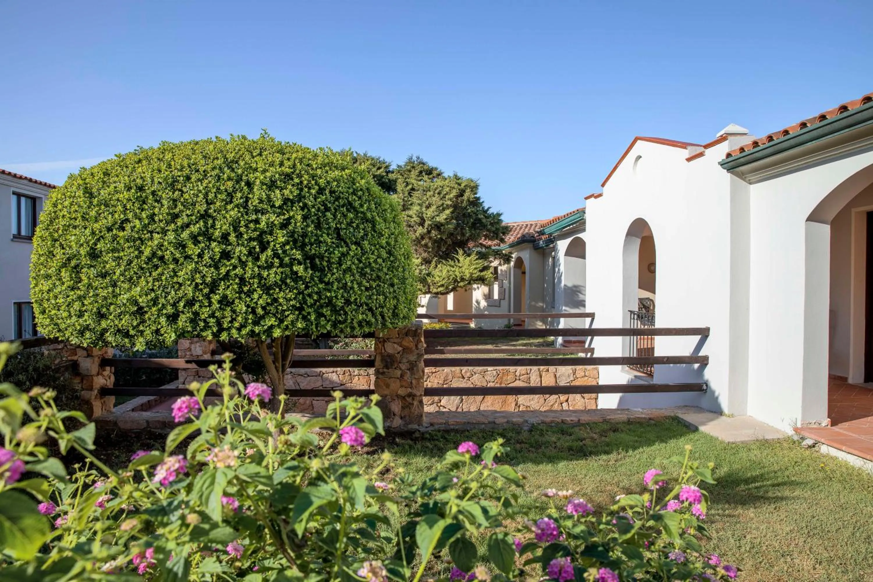 Property building in Mangia's Santa Teresa Sardinia, Curio Collection by Hilton