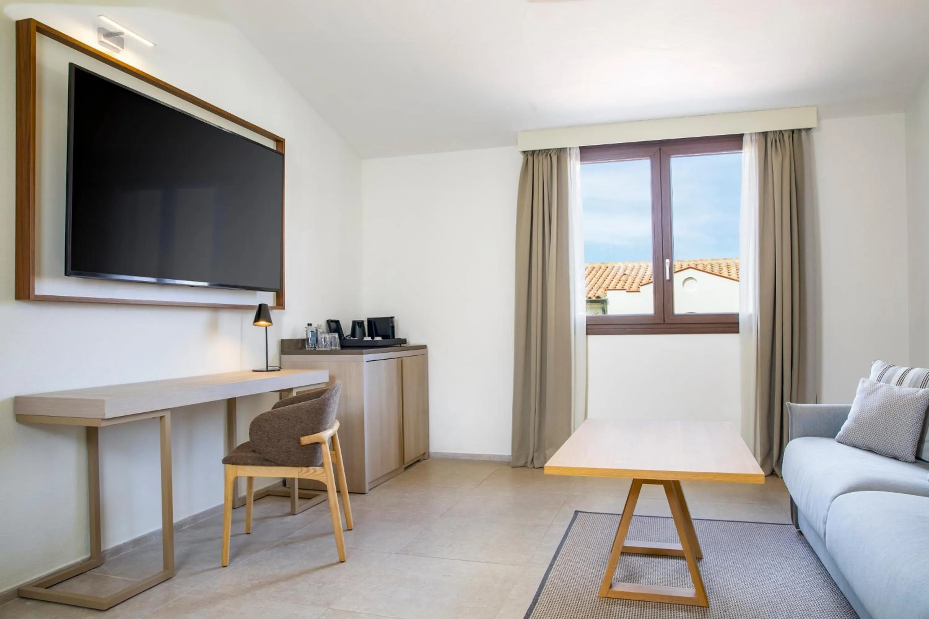 Photo of the whole room in Mangia's Santa Teresa Sardinia, Curio Collection by Hilton