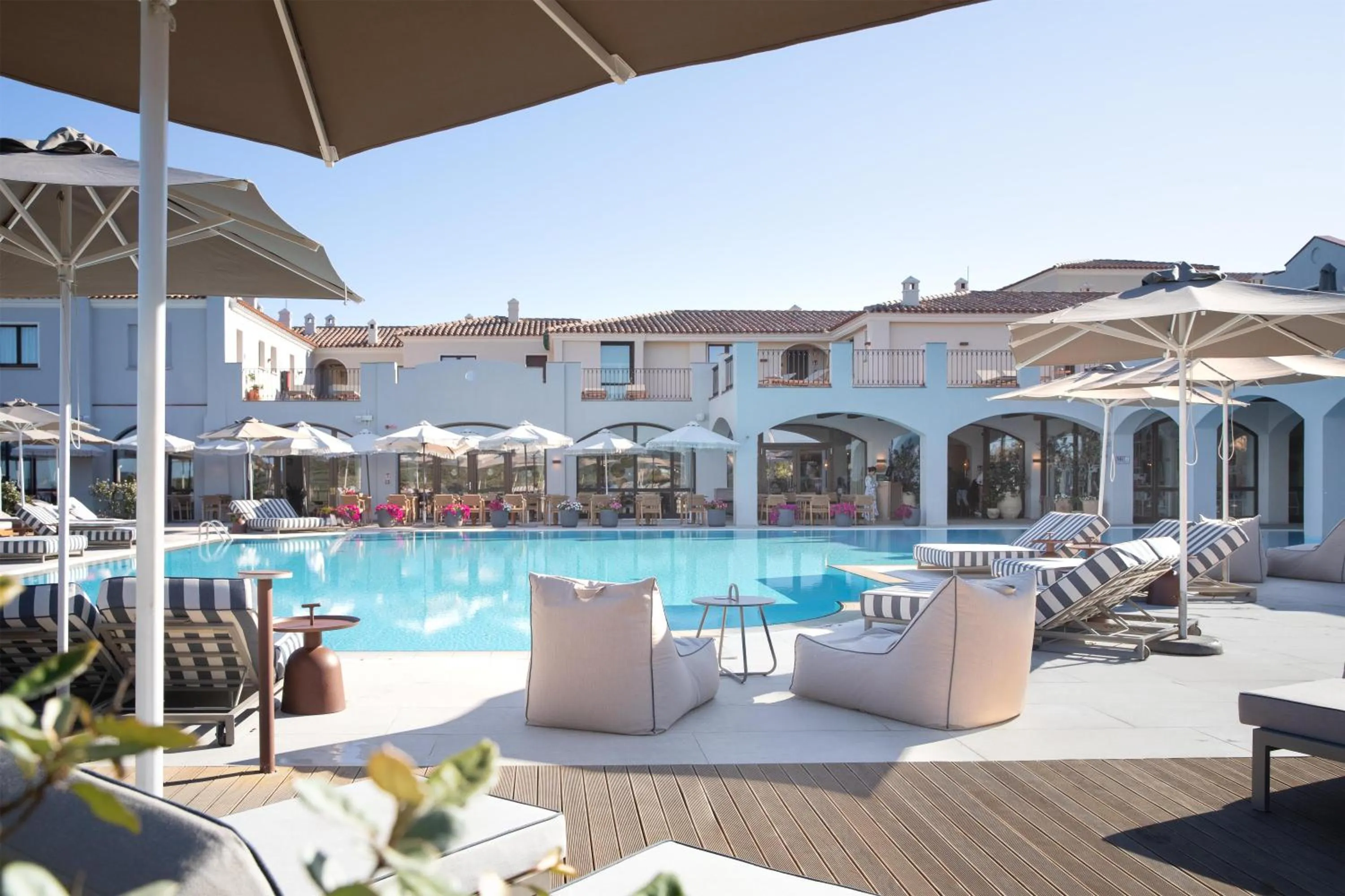 Pool view in Mangia's Santa Teresa Sardinia, Curio Collection by Hilton