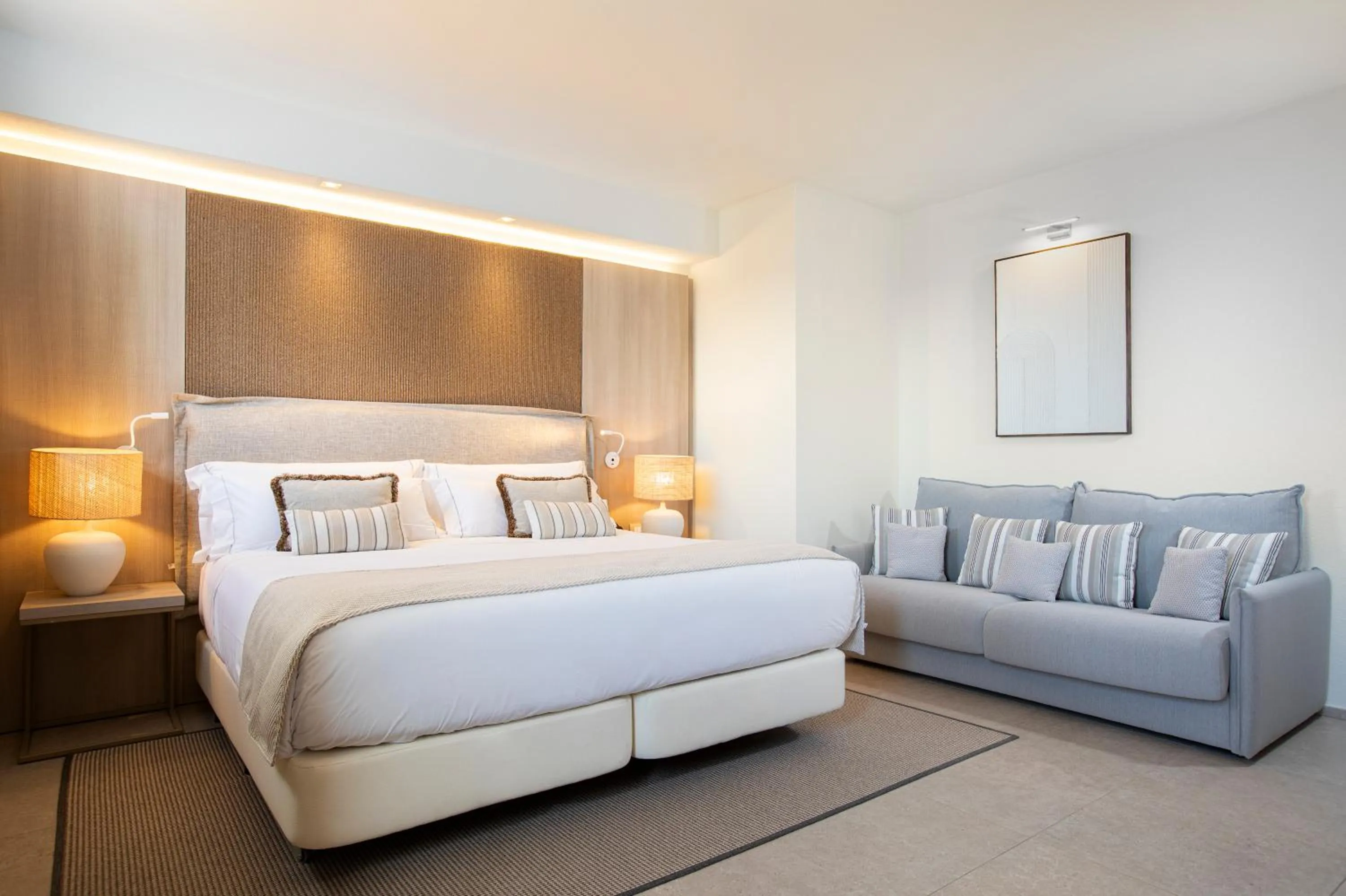 Bed in Mangia's Santa Teresa Sardinia, Curio Collection by Hilton