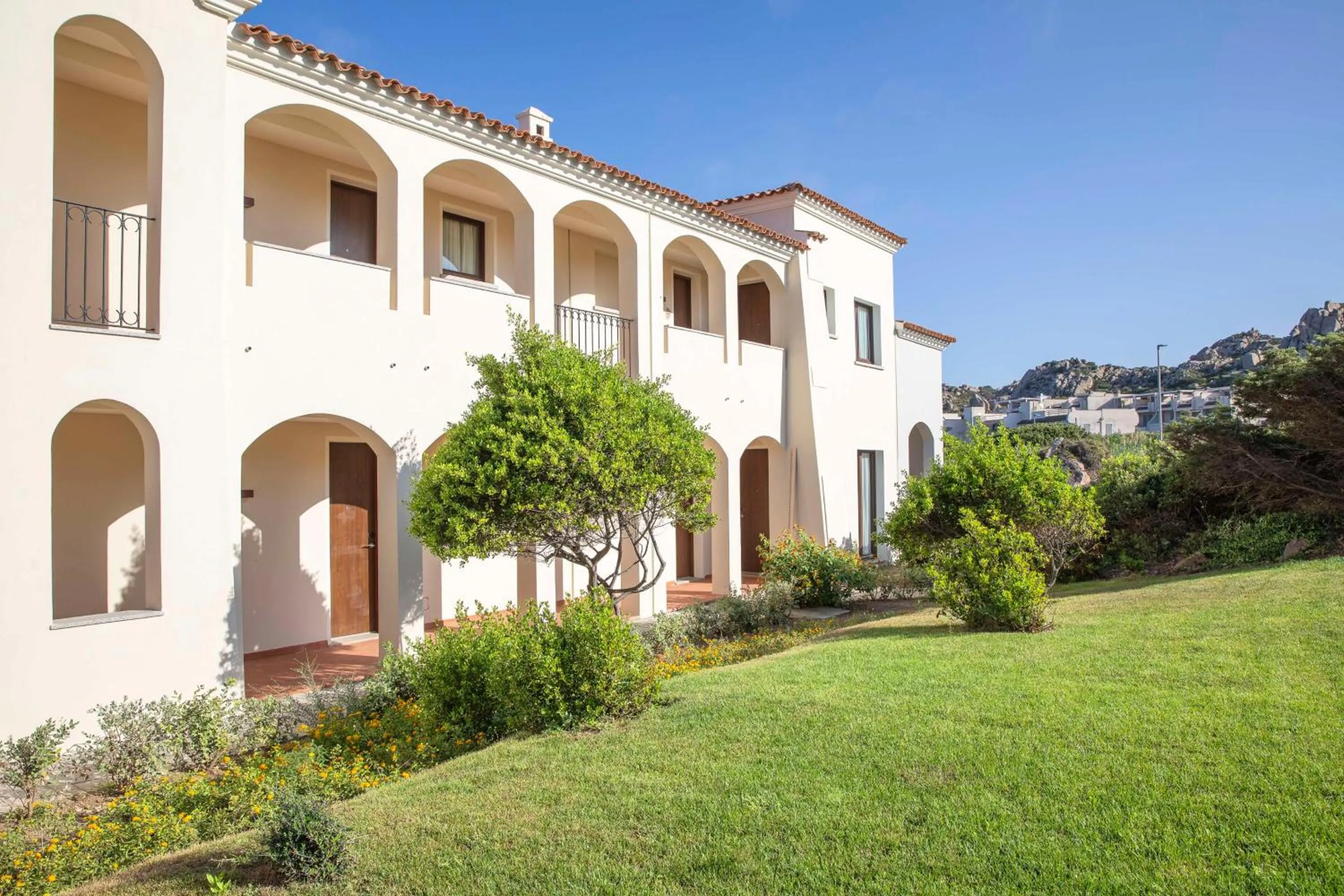 Property building in Mangia's Santa Teresa Sardinia, Curio Collection by Hilton