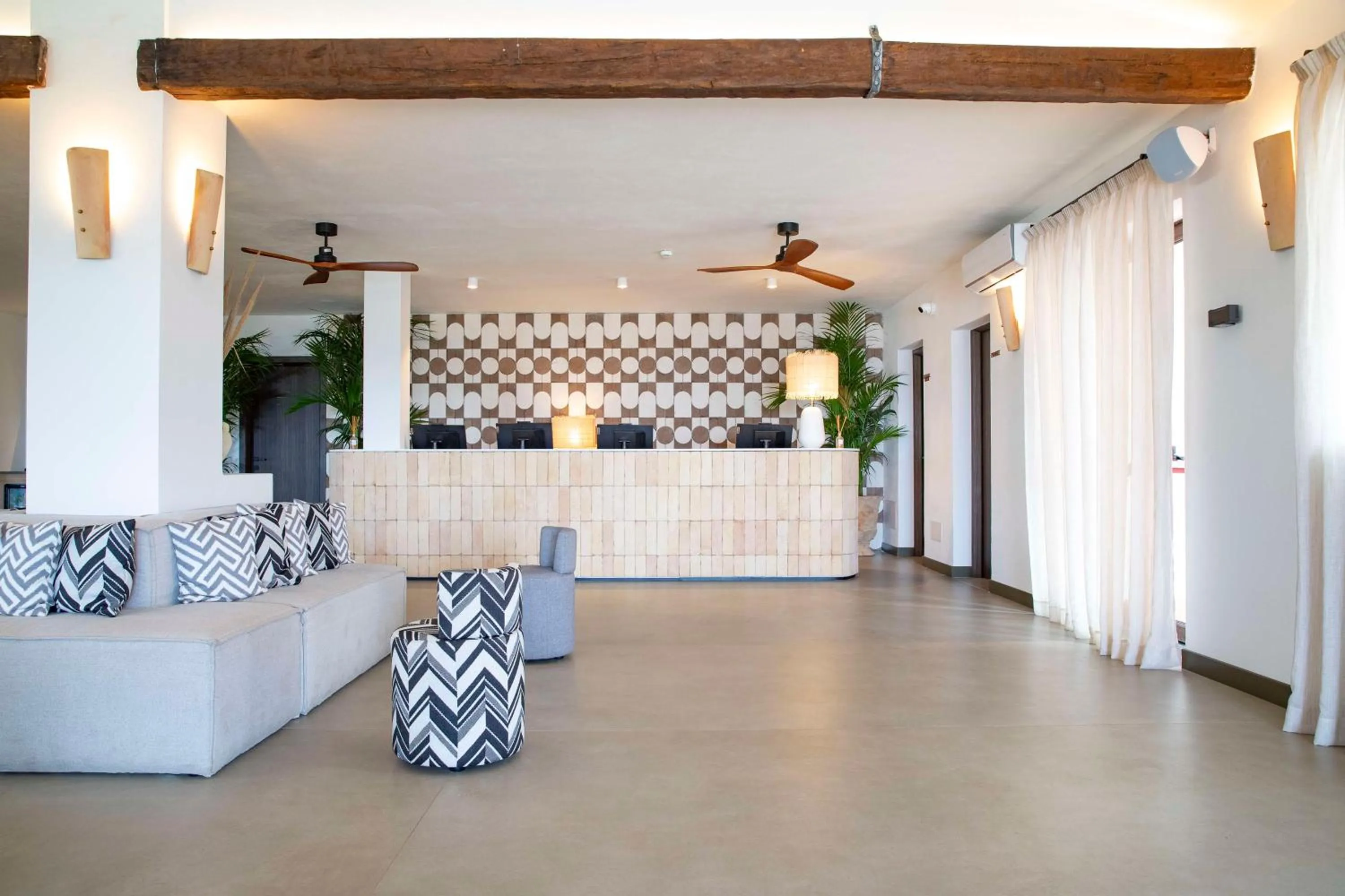 Lobby or reception in Mangia's Santa Teresa Sardinia, Curio Collection by Hilton