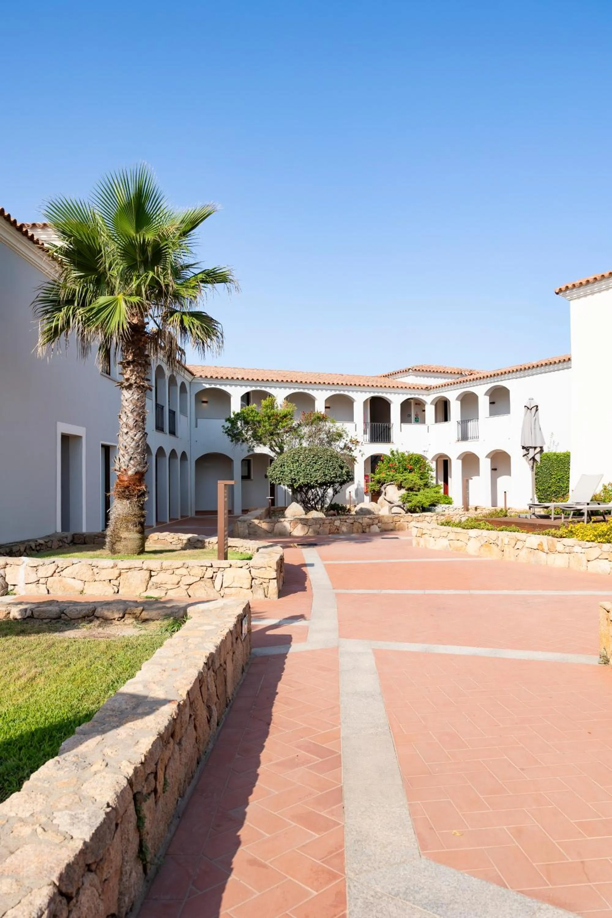 Property building in Mangia's Santa Teresa Sardinia, Curio Collection by Hilton