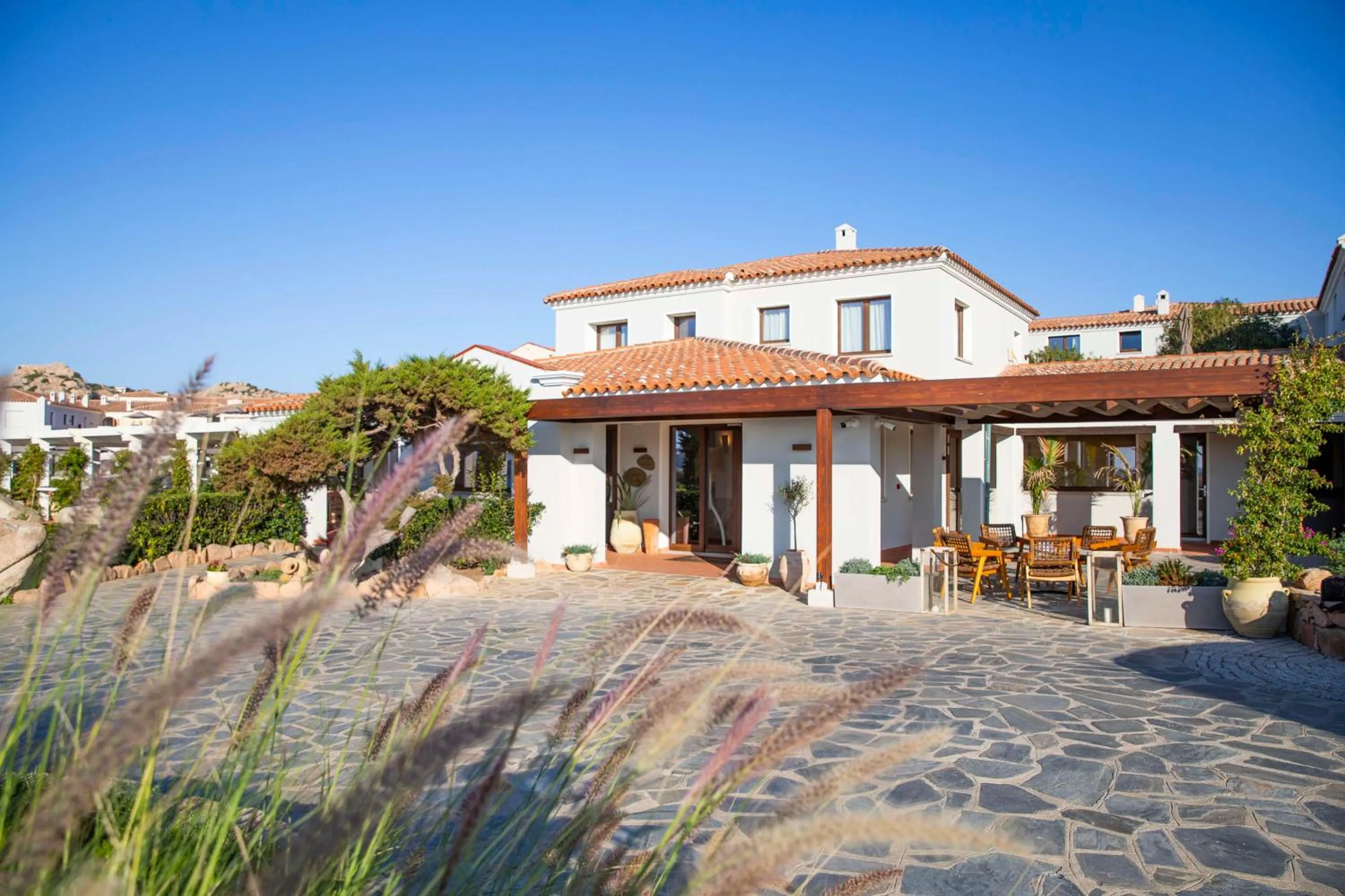 Property building in Mangia's Santa Teresa Sardinia, Curio Collection by Hilton