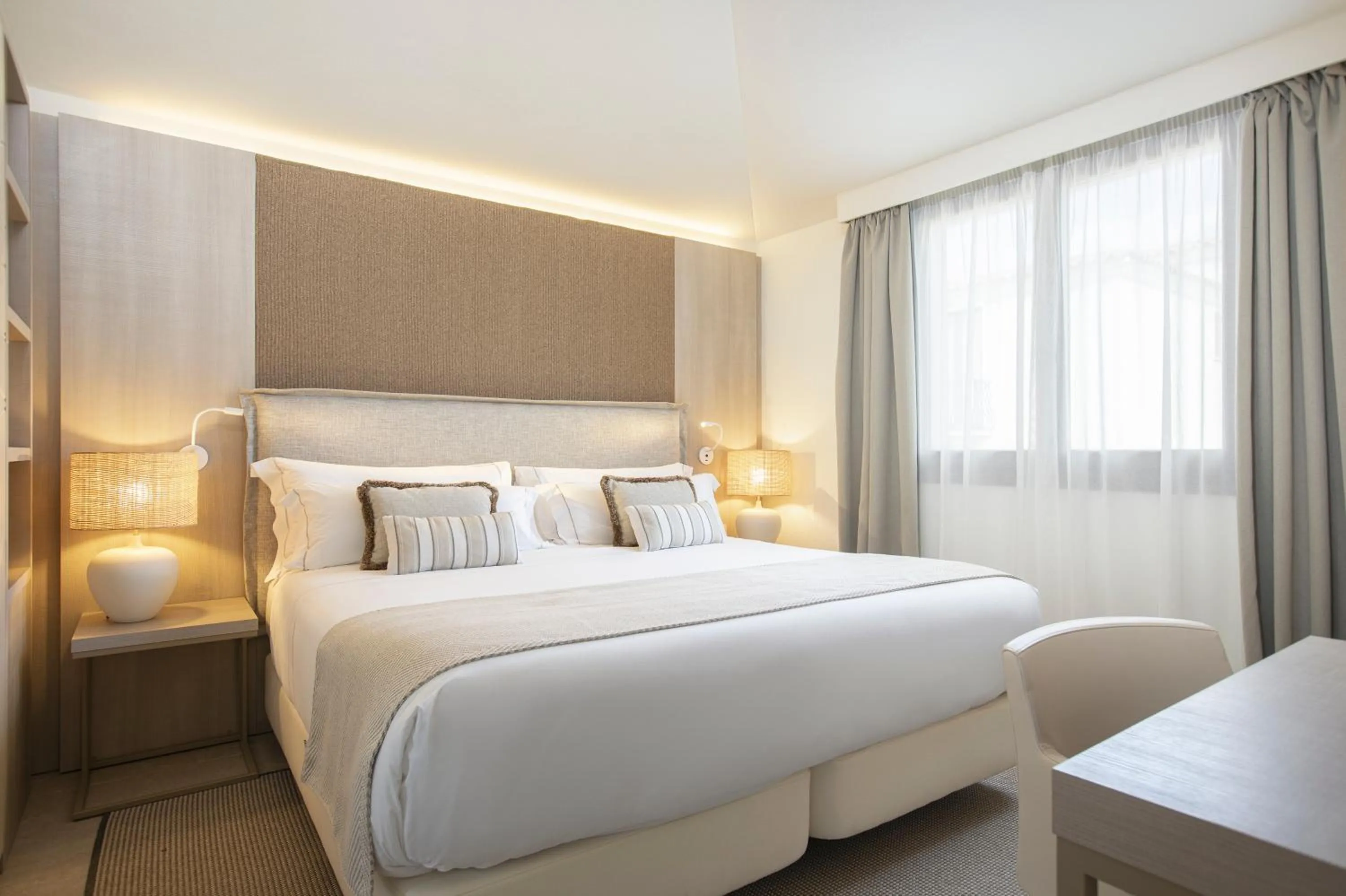 Bed in Mangia's Santa Teresa Sardinia, Curio Collection by Hilton