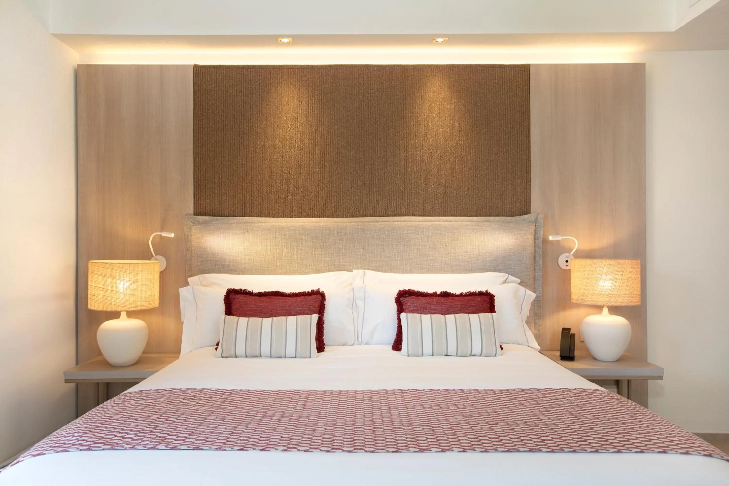 Bed in Mangia's Santa Teresa Sardinia, Curio Collection by Hilton