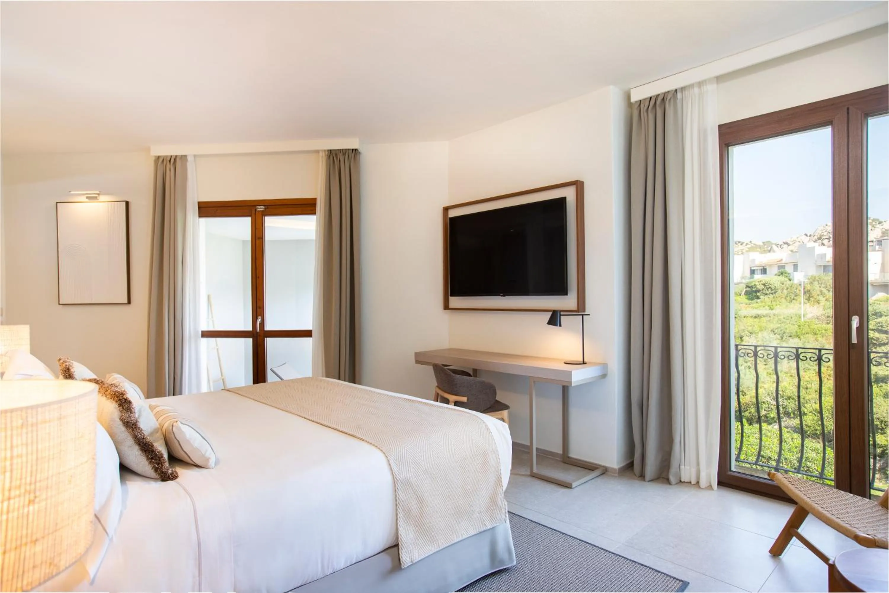 Bed in Mangia's Santa Teresa Sardinia, Curio Collection by Hilton