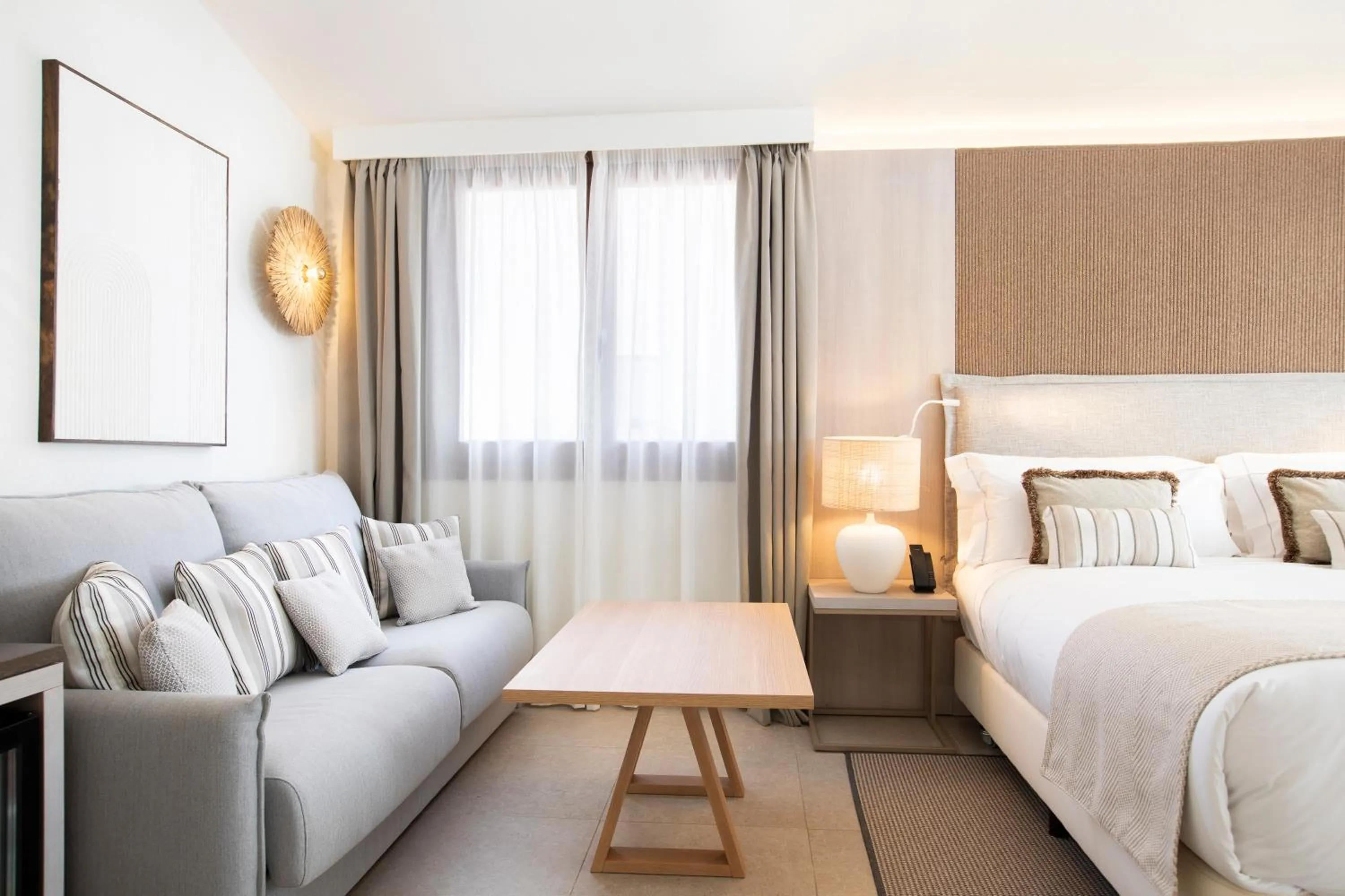 Bed in Mangia's Santa Teresa Sardinia, Curio Collection by Hilton