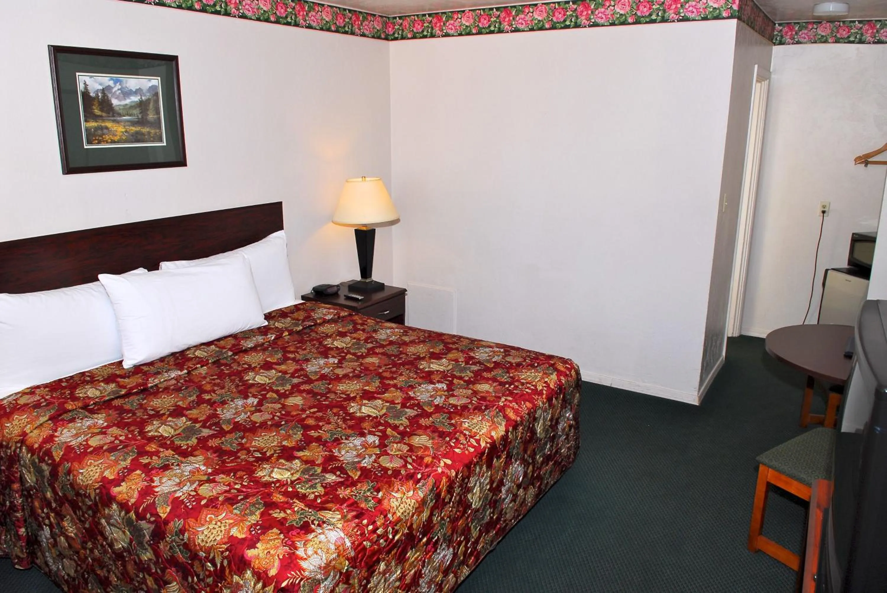 Bedroom, Bed in Stone Inn Extended Stay U of A