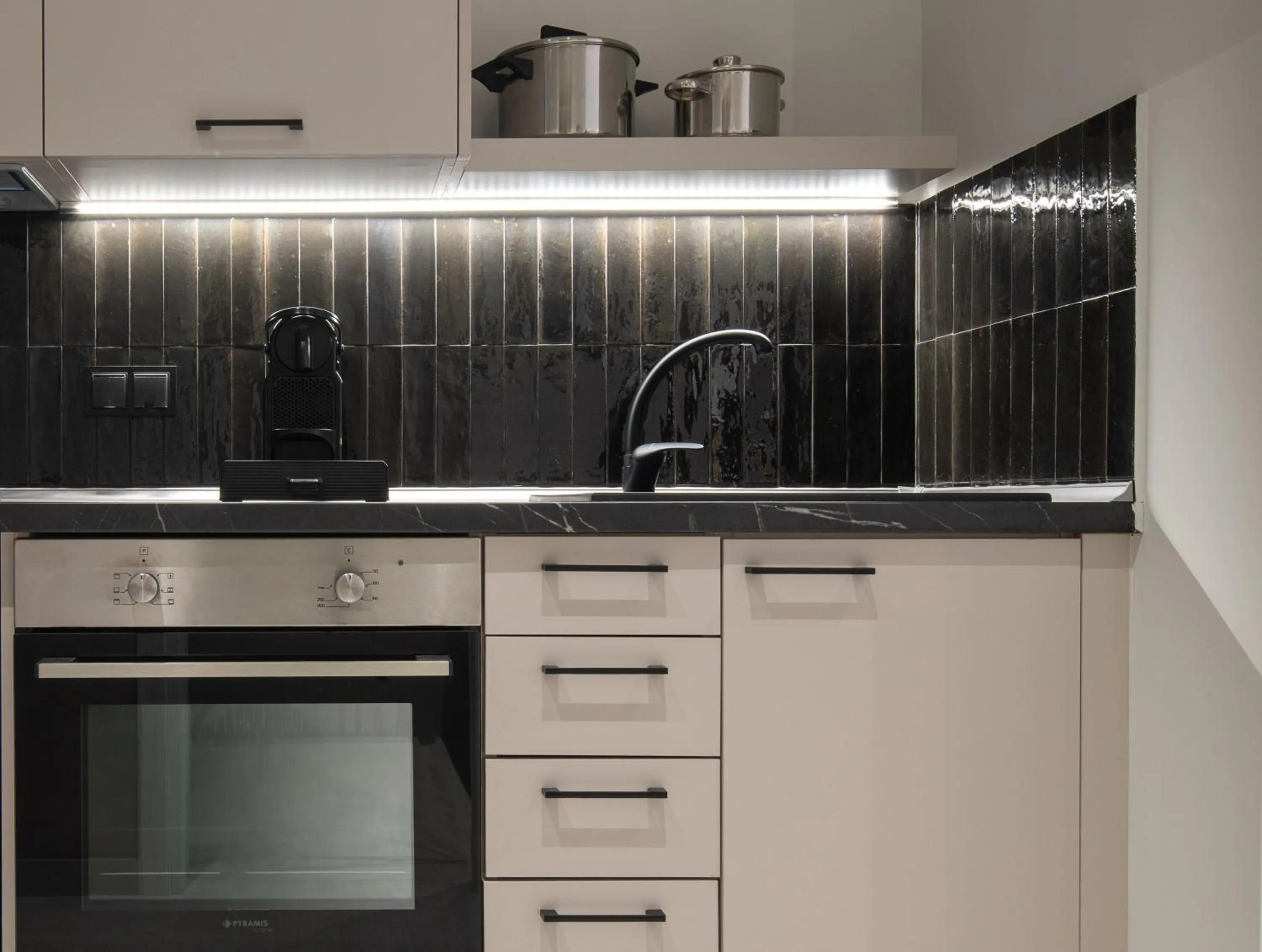 Kitchen or kitchenette in Philoxenia Hotel