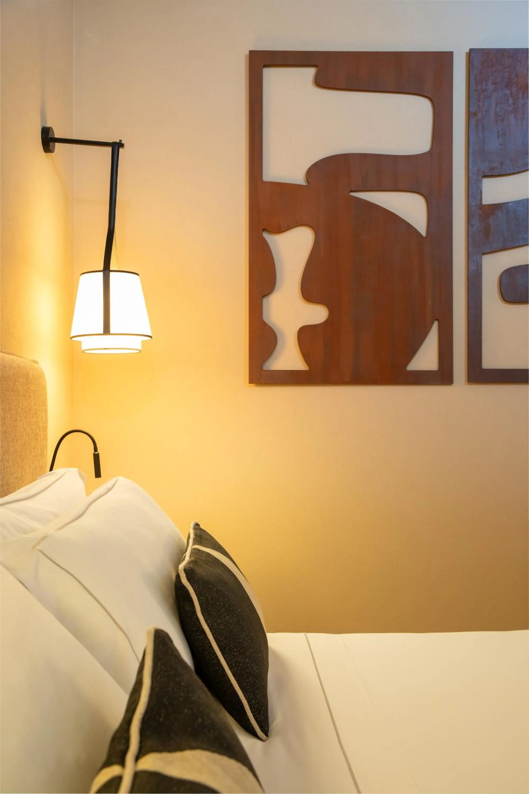 Bed in Mangia's Sardinia Resort