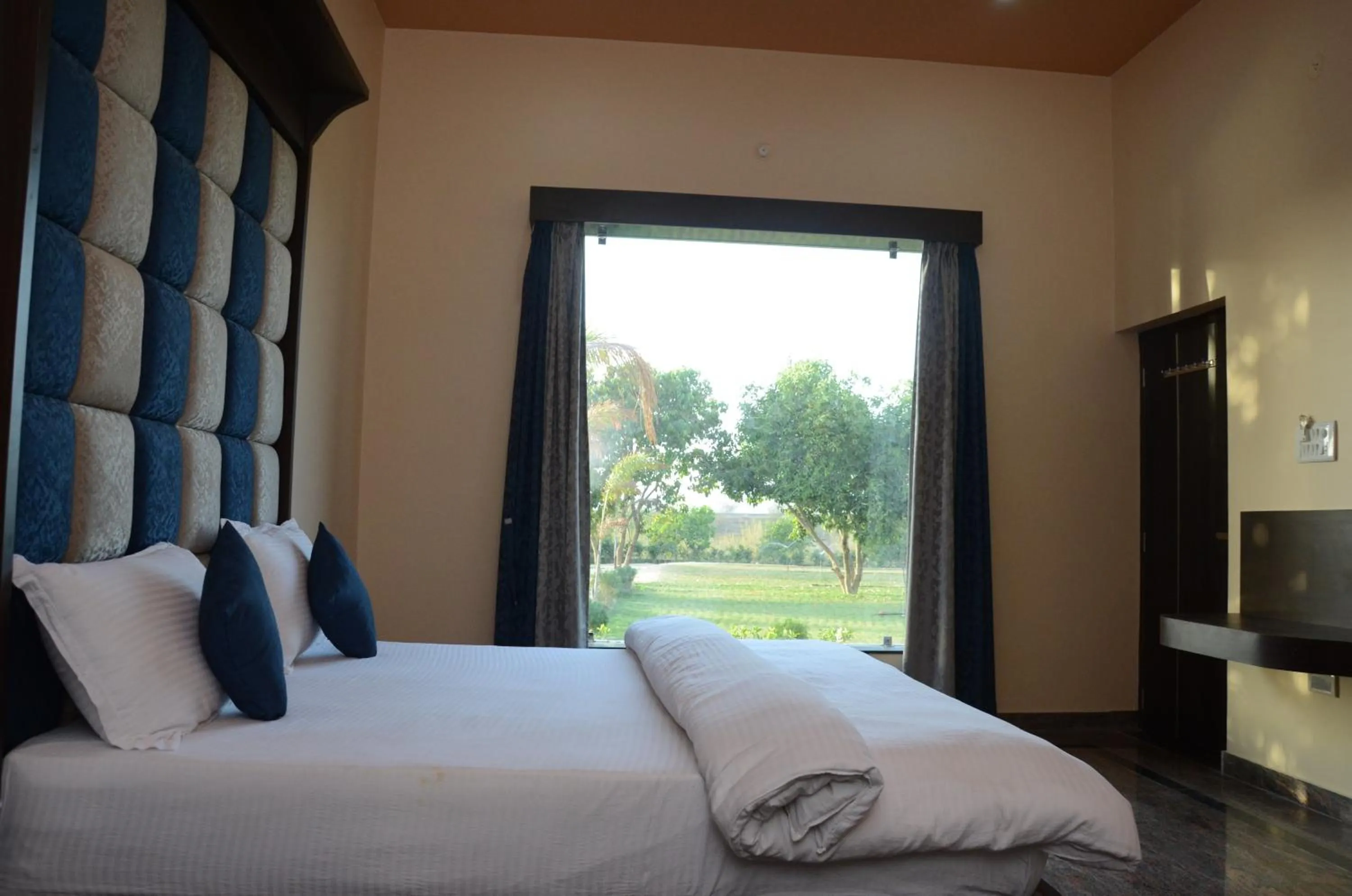 Bed in Chitrakoot Garden and Resorts