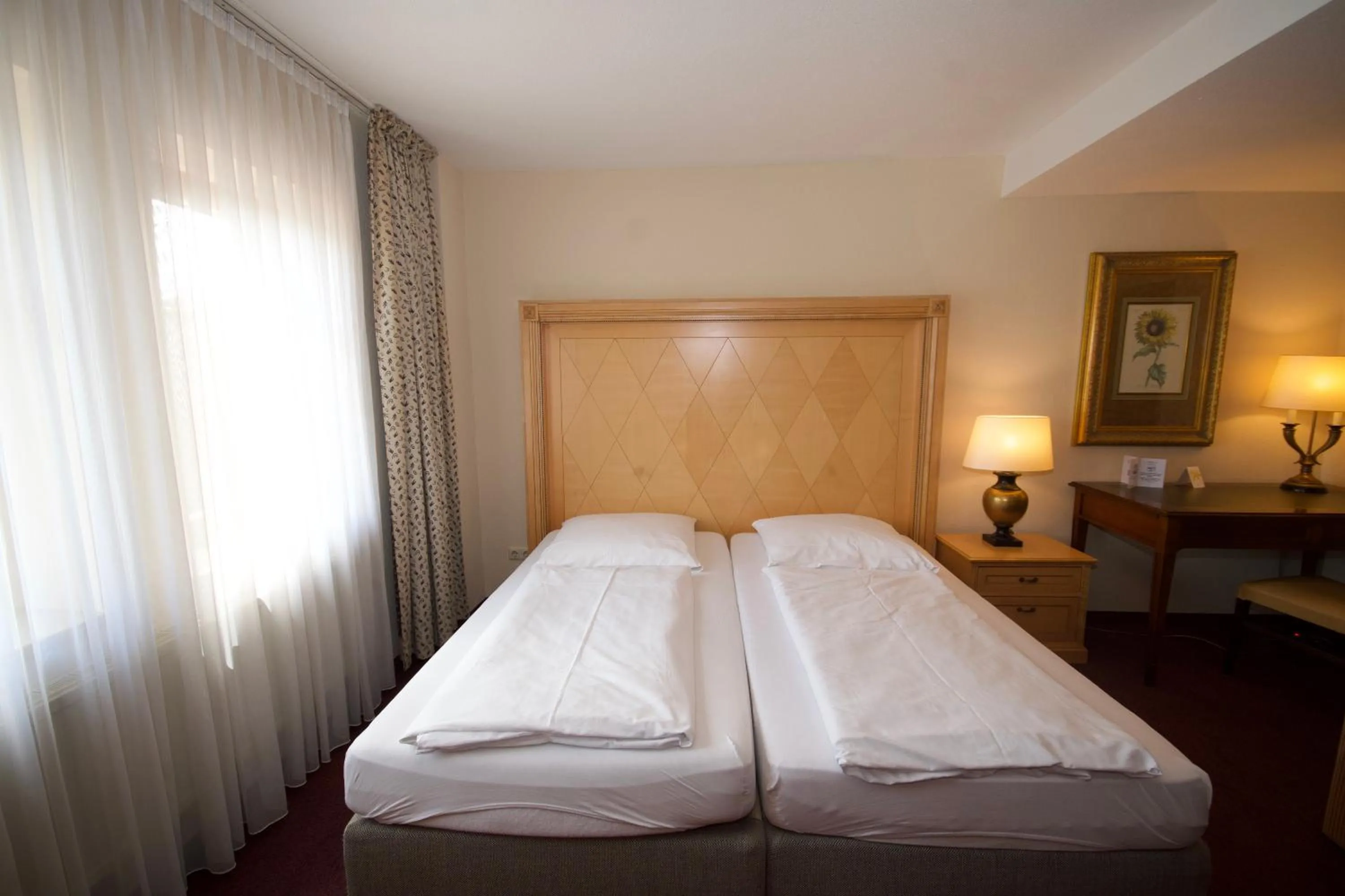 Bed in Gästehaus Bavaria