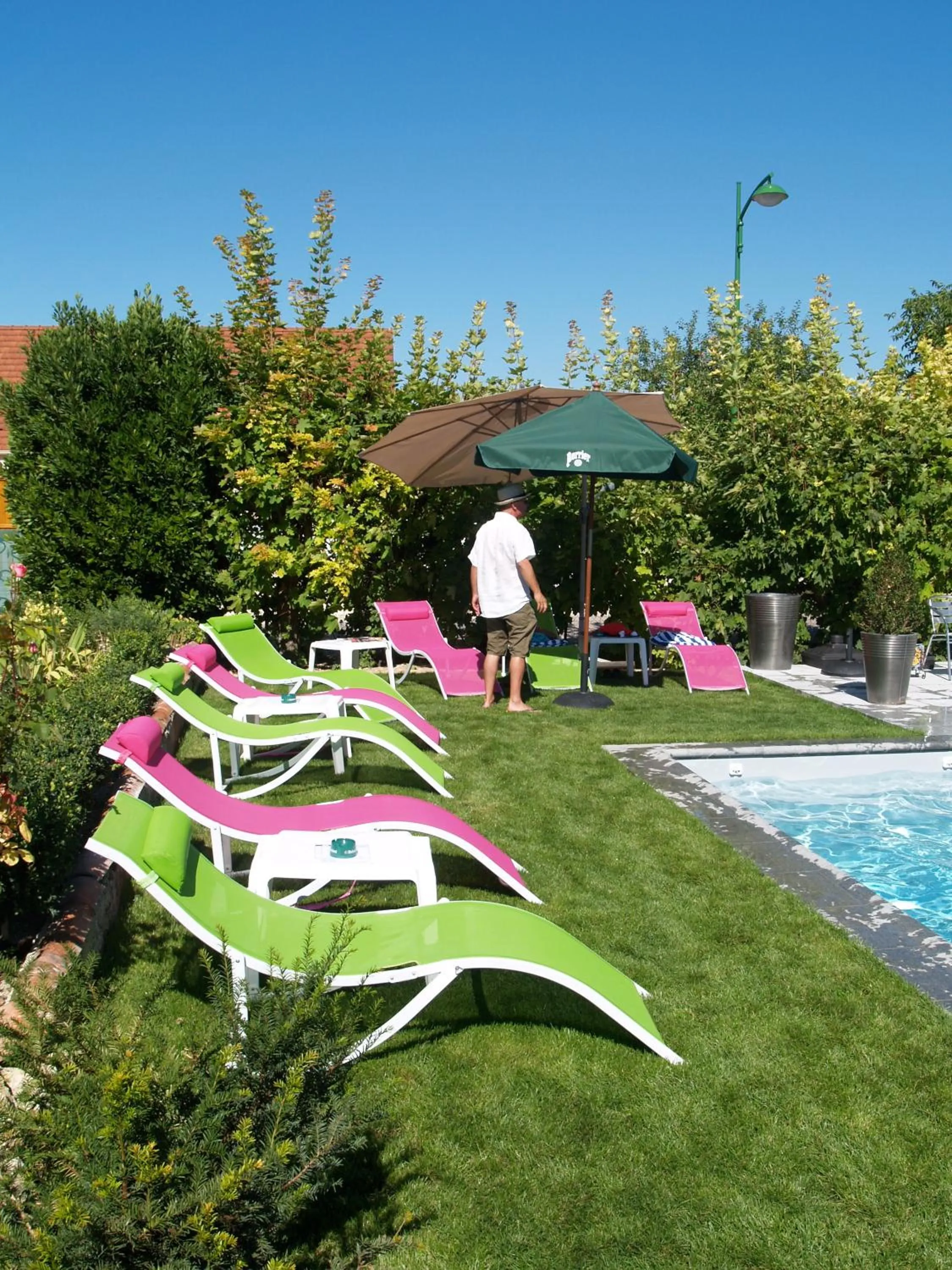 Swimming pool in Logis Auberge Des Moissons