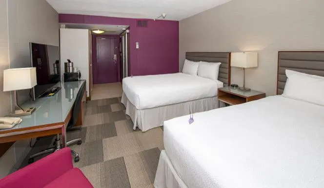 Bed in Coast Prince George Hotel by APA