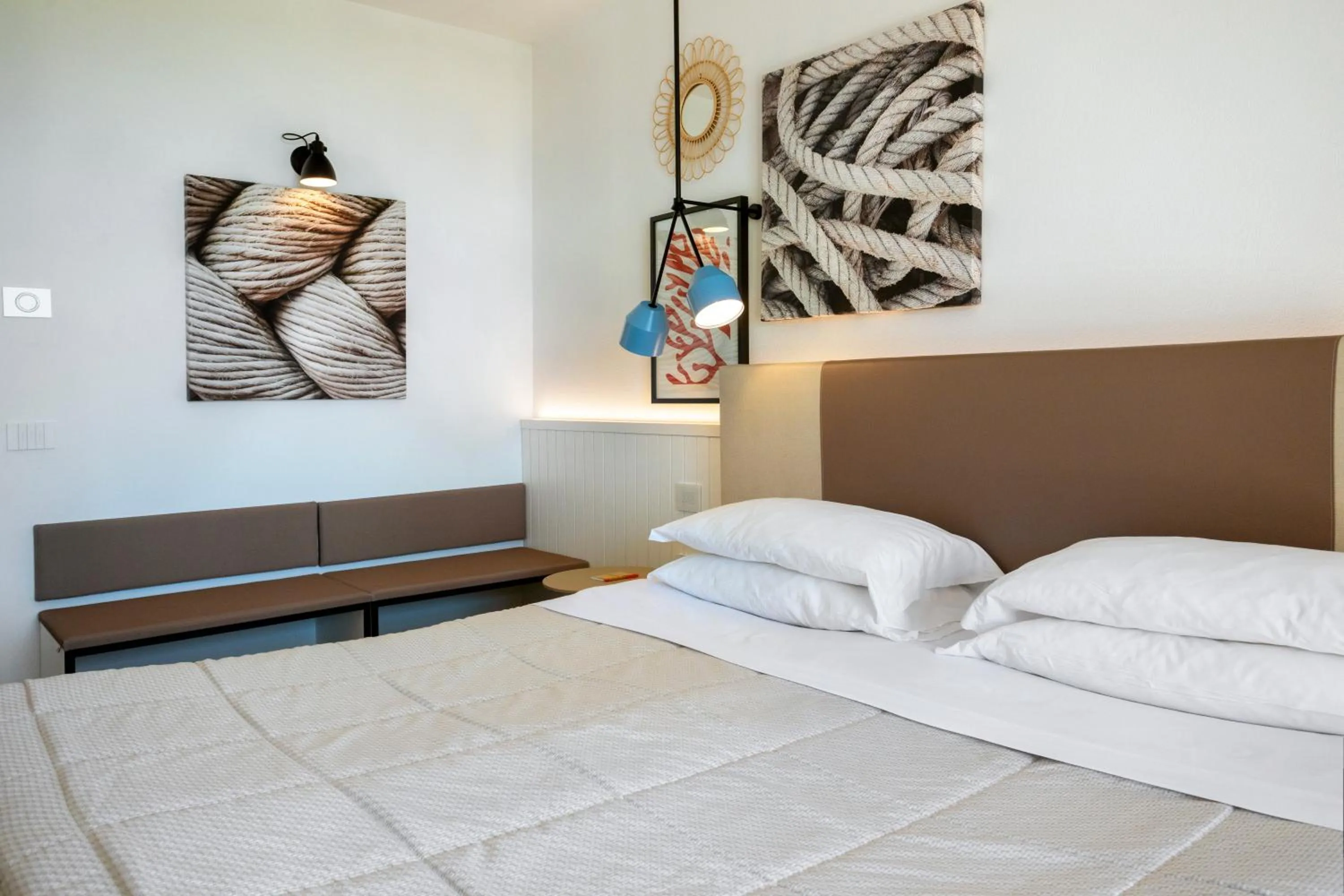 Bed in Mangia's Torre Del Barone Resort & SPA