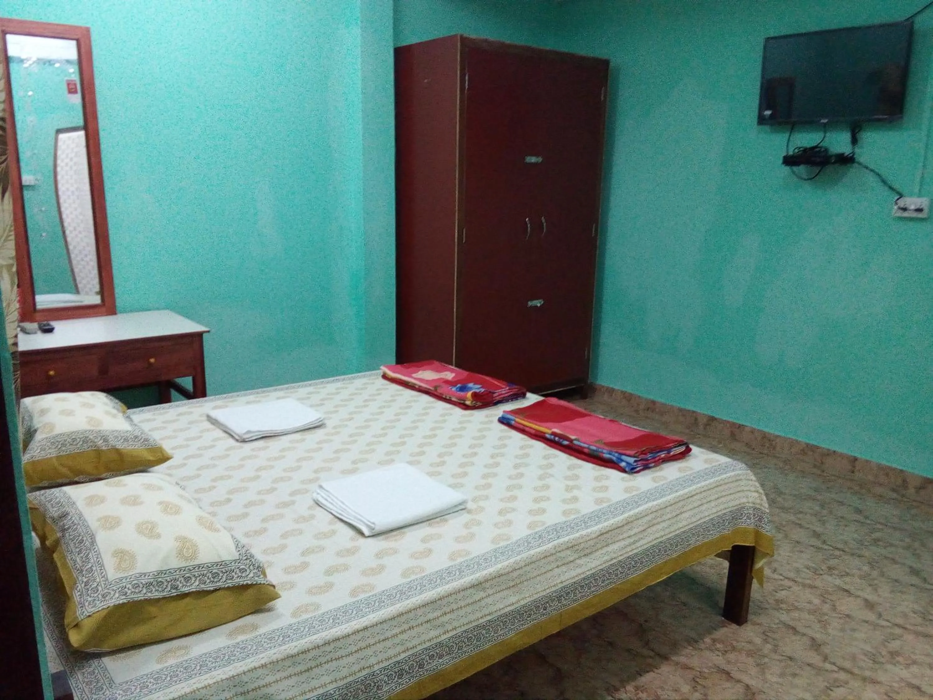 Photo of the whole room, Bed in The Lotus Home