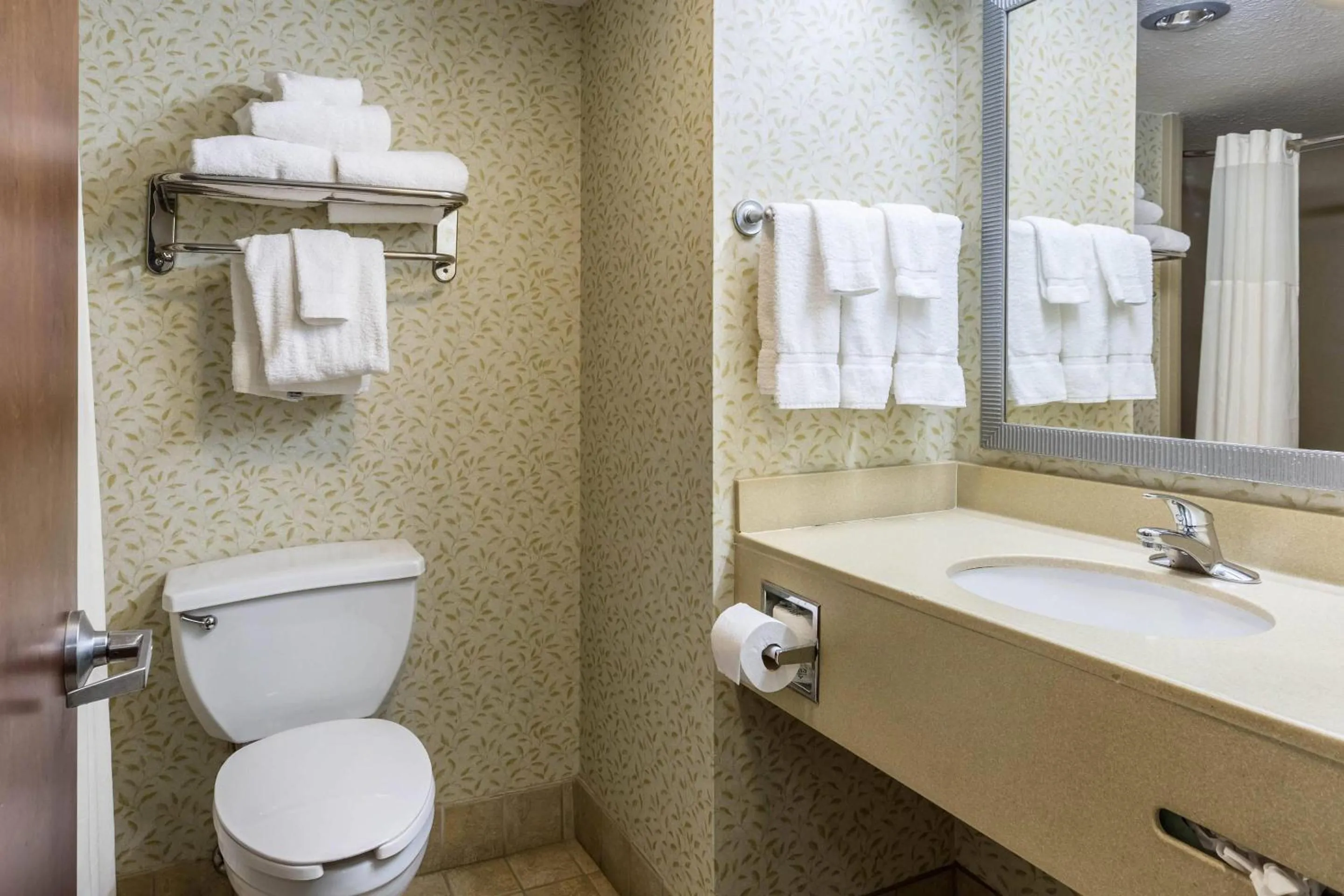 Bedroom in Clarion Pointe Huntsville Research Park