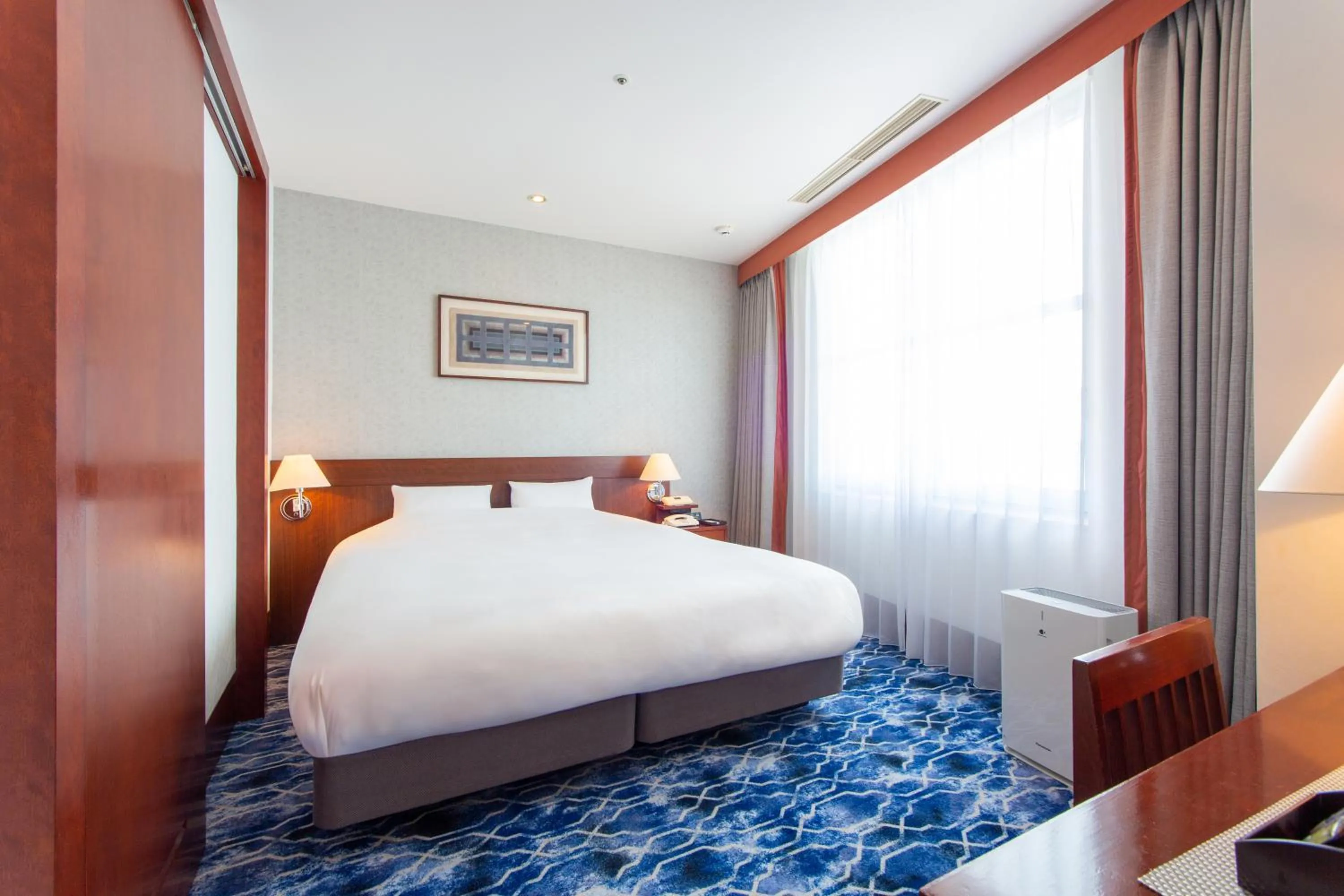 Bed in Premier Hotel Mojiko