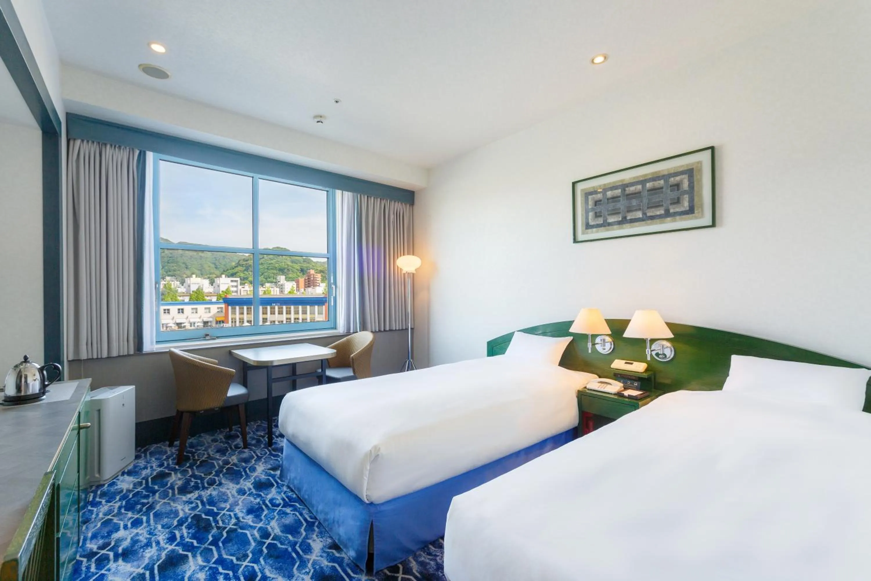 Bed in Premier Hotel Mojiko