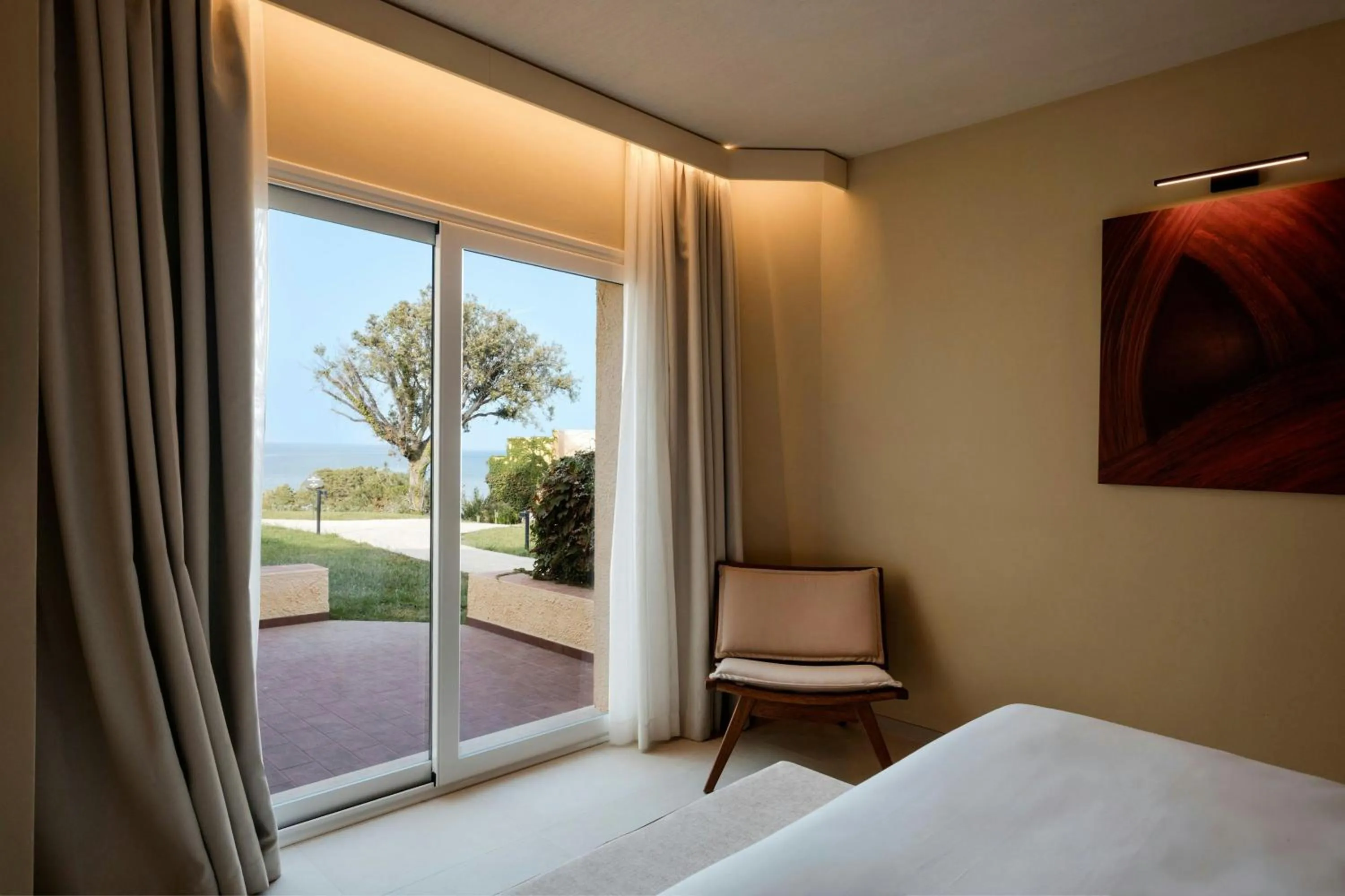 Photo of the whole room, Bed in Mangia's Brucoli, Sicily, Autograph Collection