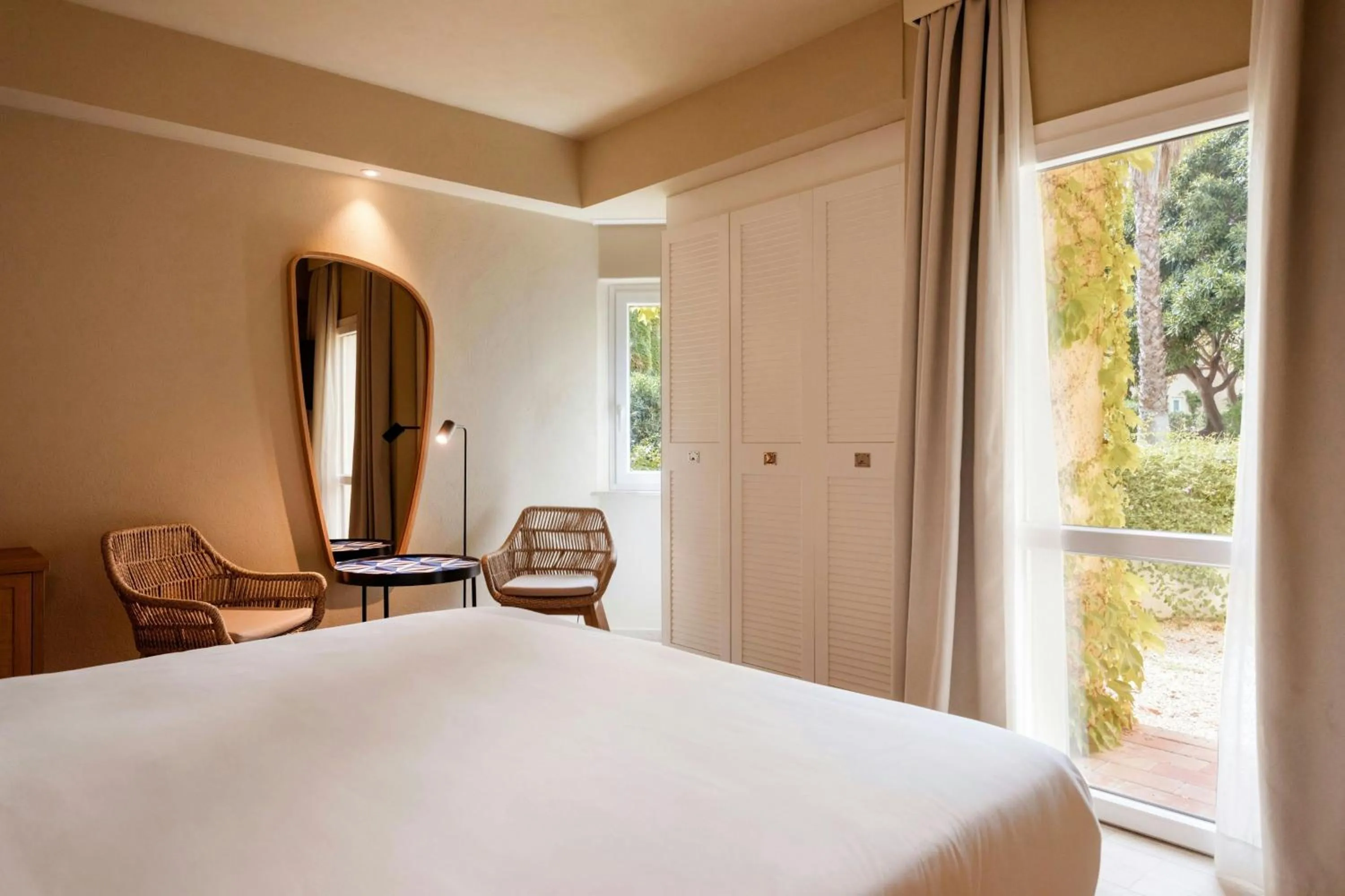 Photo of the whole room, Bed in Mangia's Brucoli, Sicily, Autograph Collection