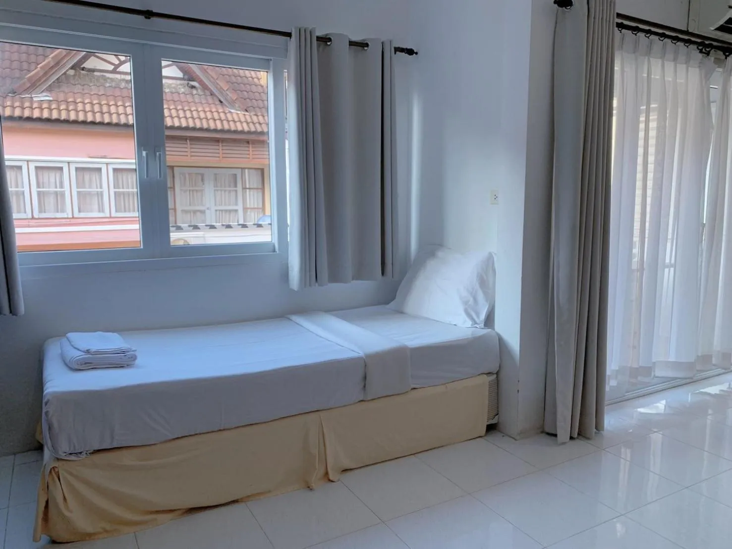 Bed in Sunshine Guest House