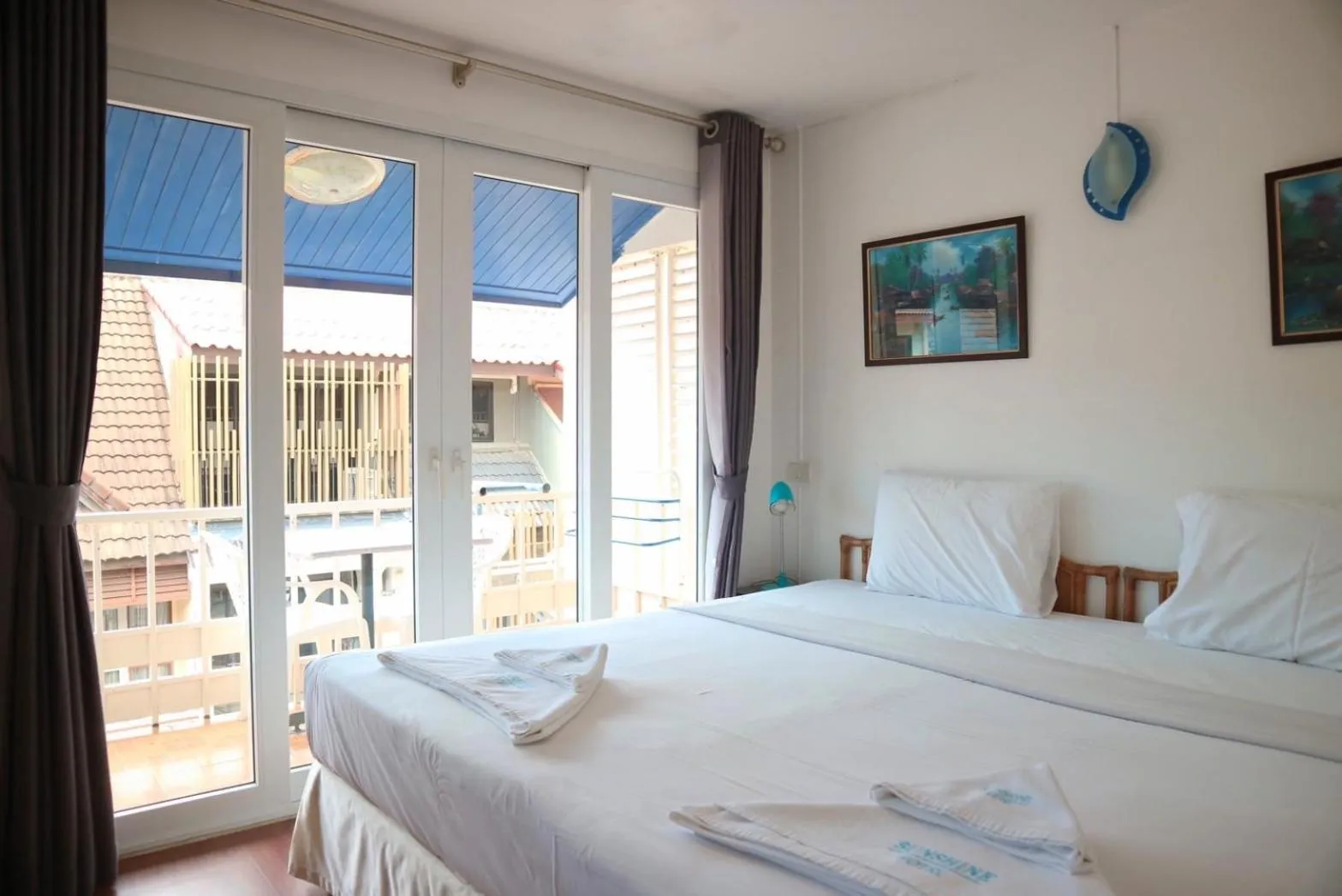 Bed in Sunshine Guest House