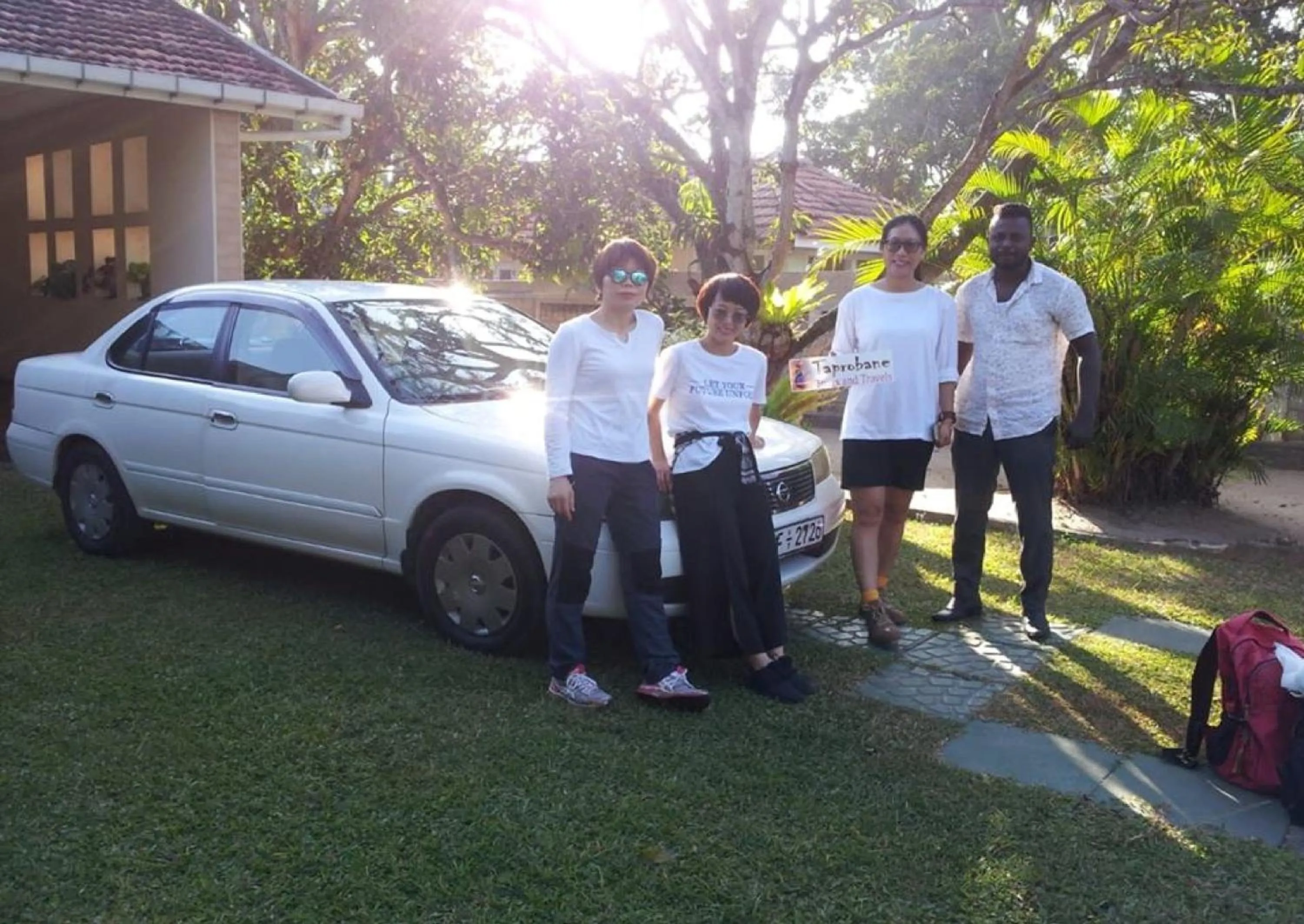 Staff in Mama's Hostel by Taprobane