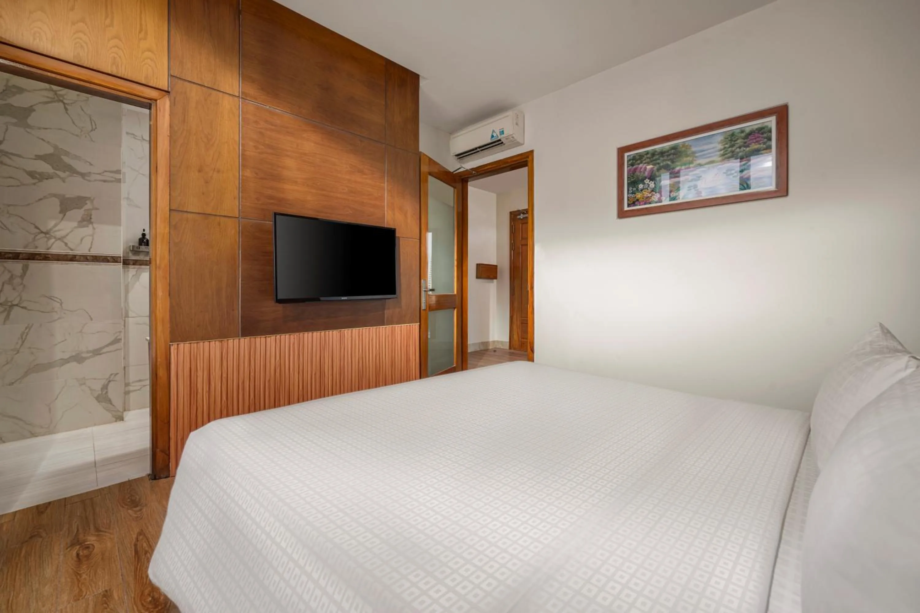 Bed in Nhu Minh Plaza Danang Hotel