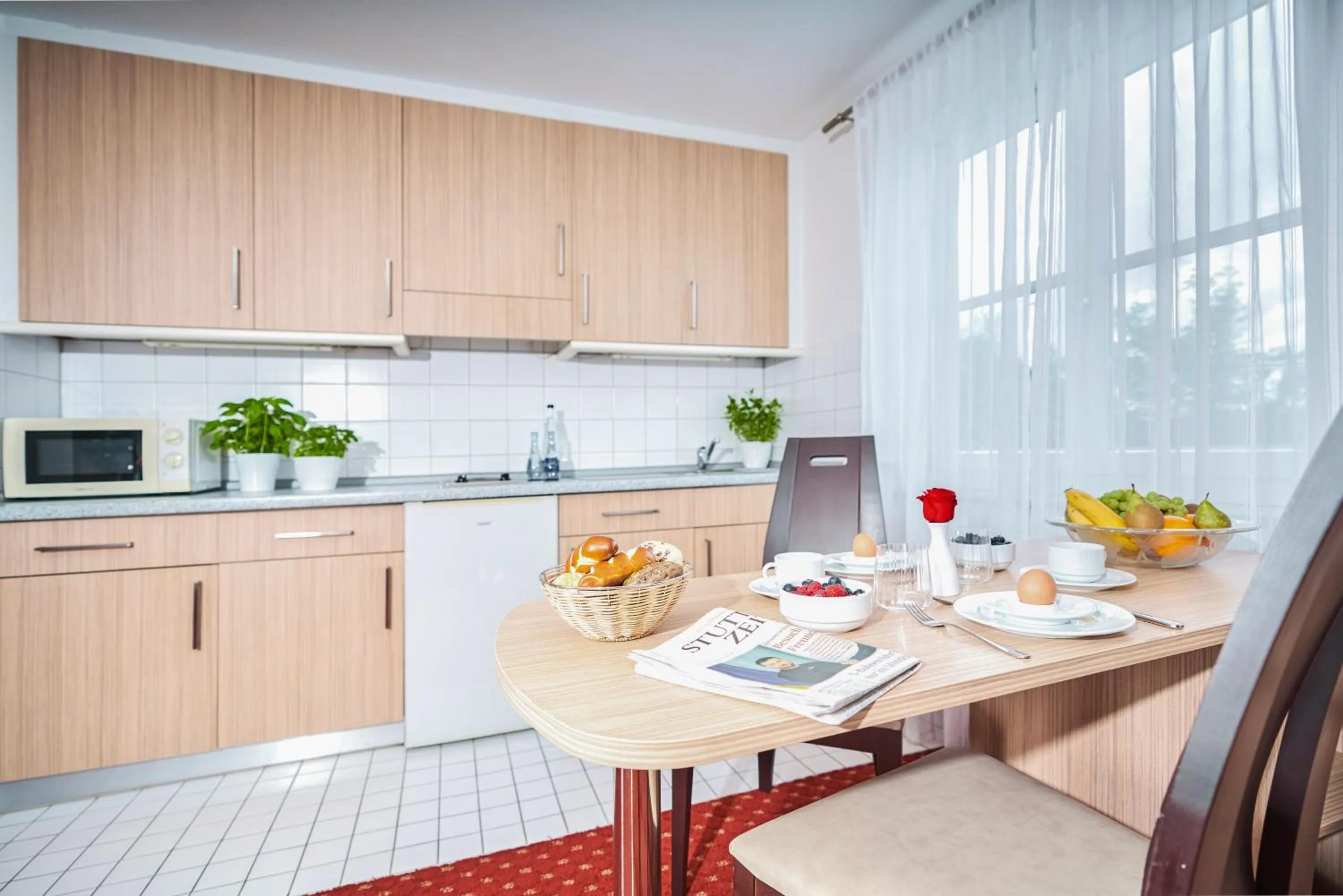 Kitchen or kitchenette in Apart Business Hotel