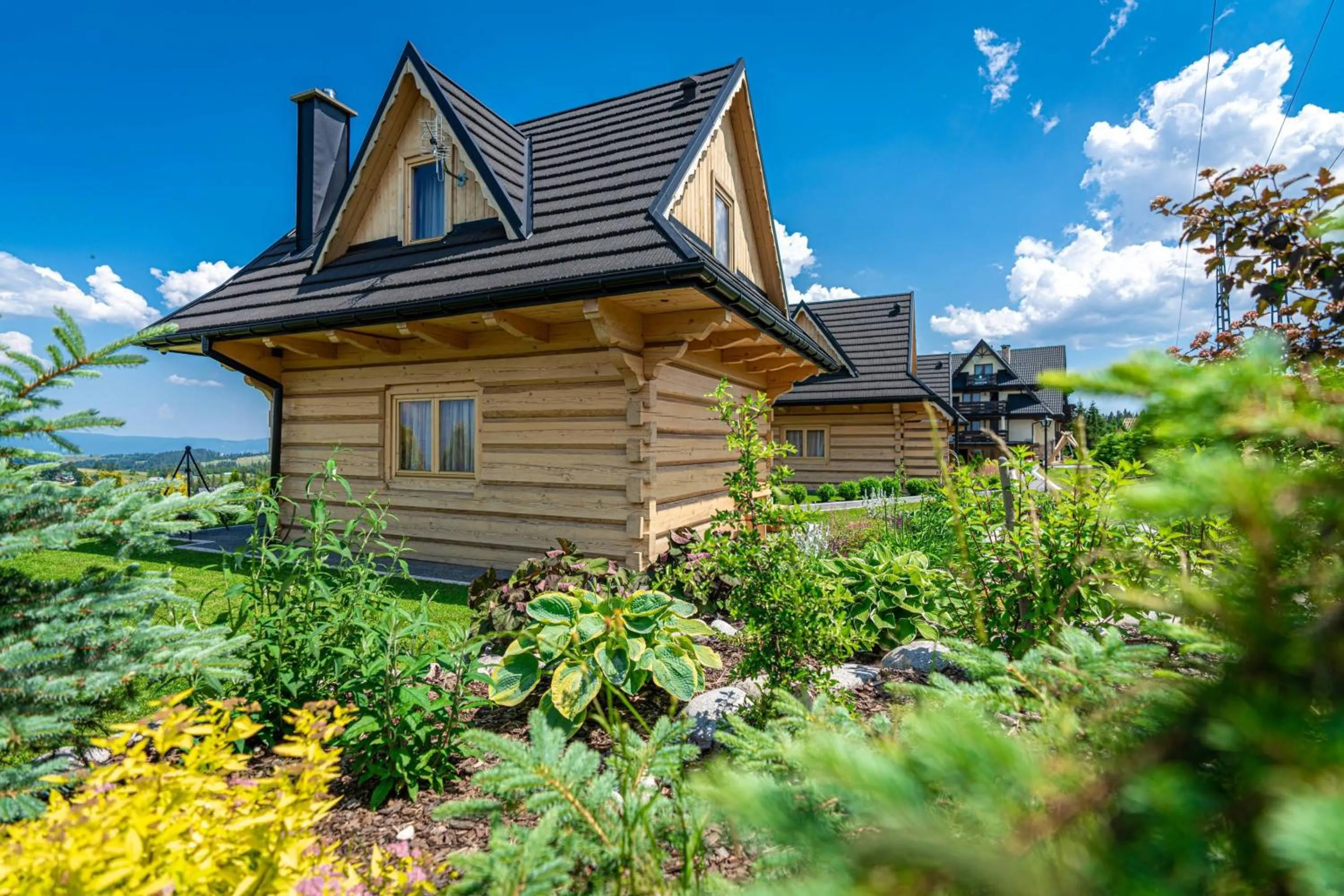 Garden in Domki Górskie Janosik, Kwicoł i Pyzdra Jacuzzi, Sauna