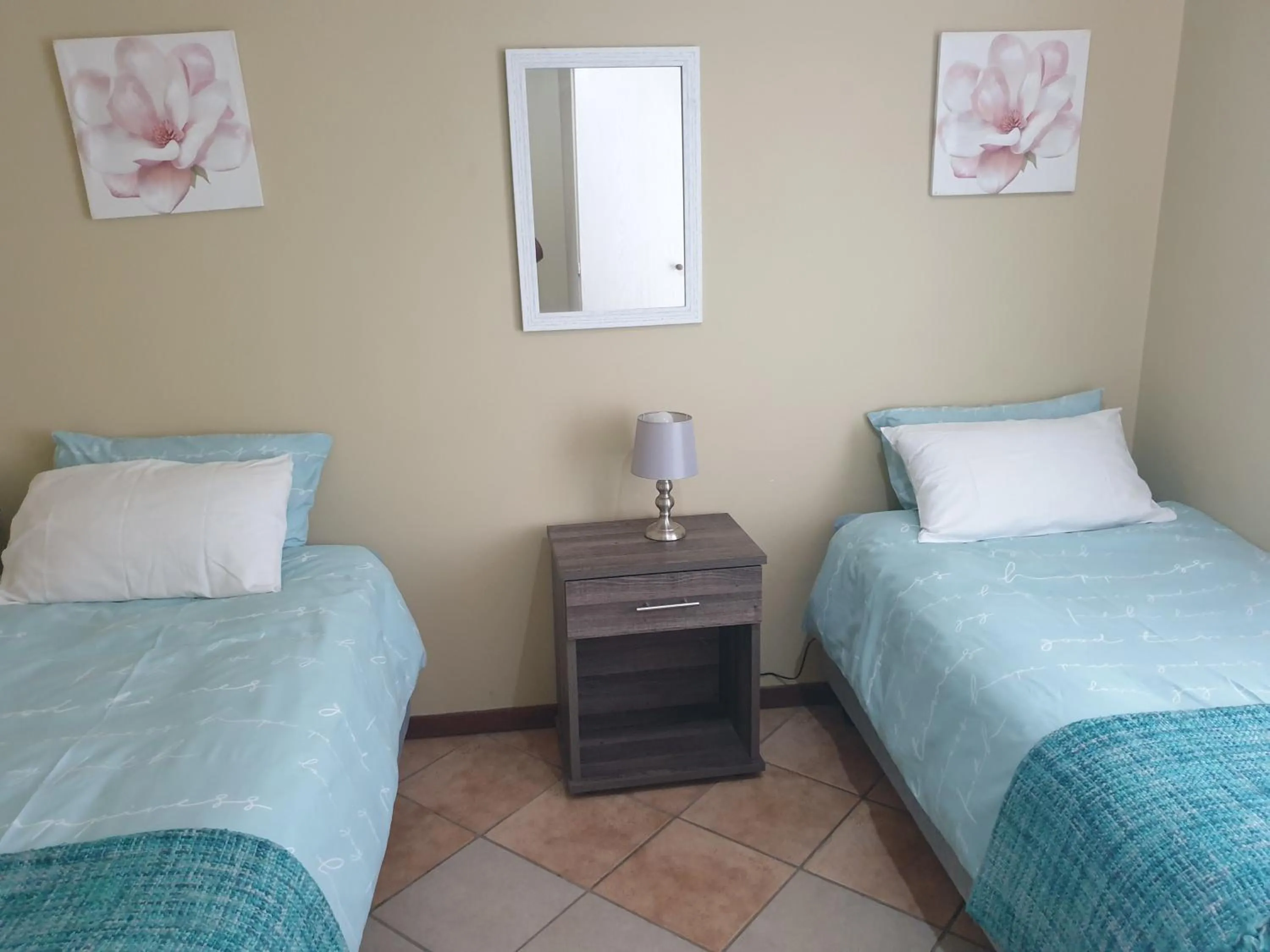 Two-Bedroom Apartment with Balcony - single occupancy in Clearwater Self catering Apartments No Loadshedding