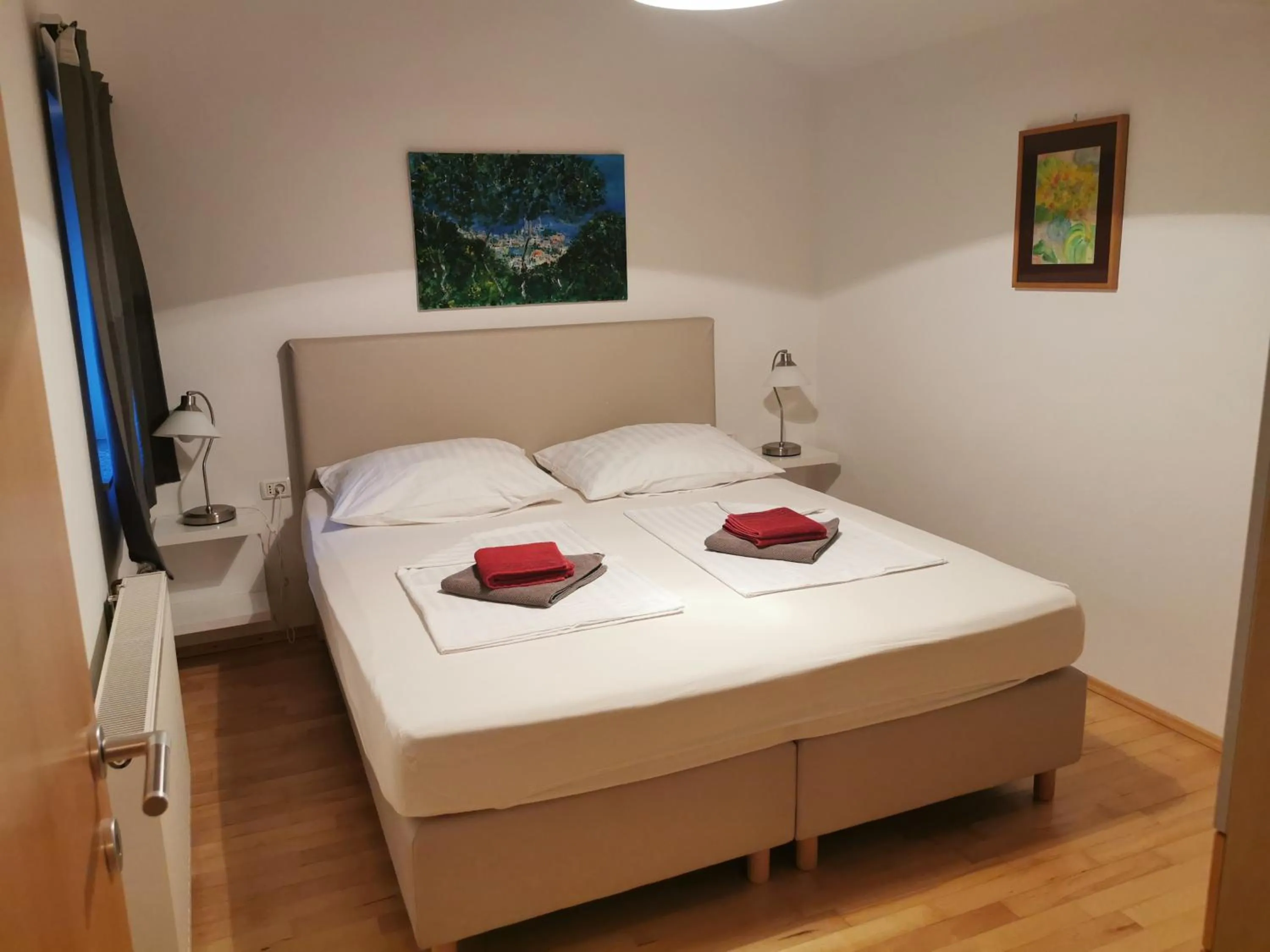 Bed in BC Better Choice Apartments with Central Heating