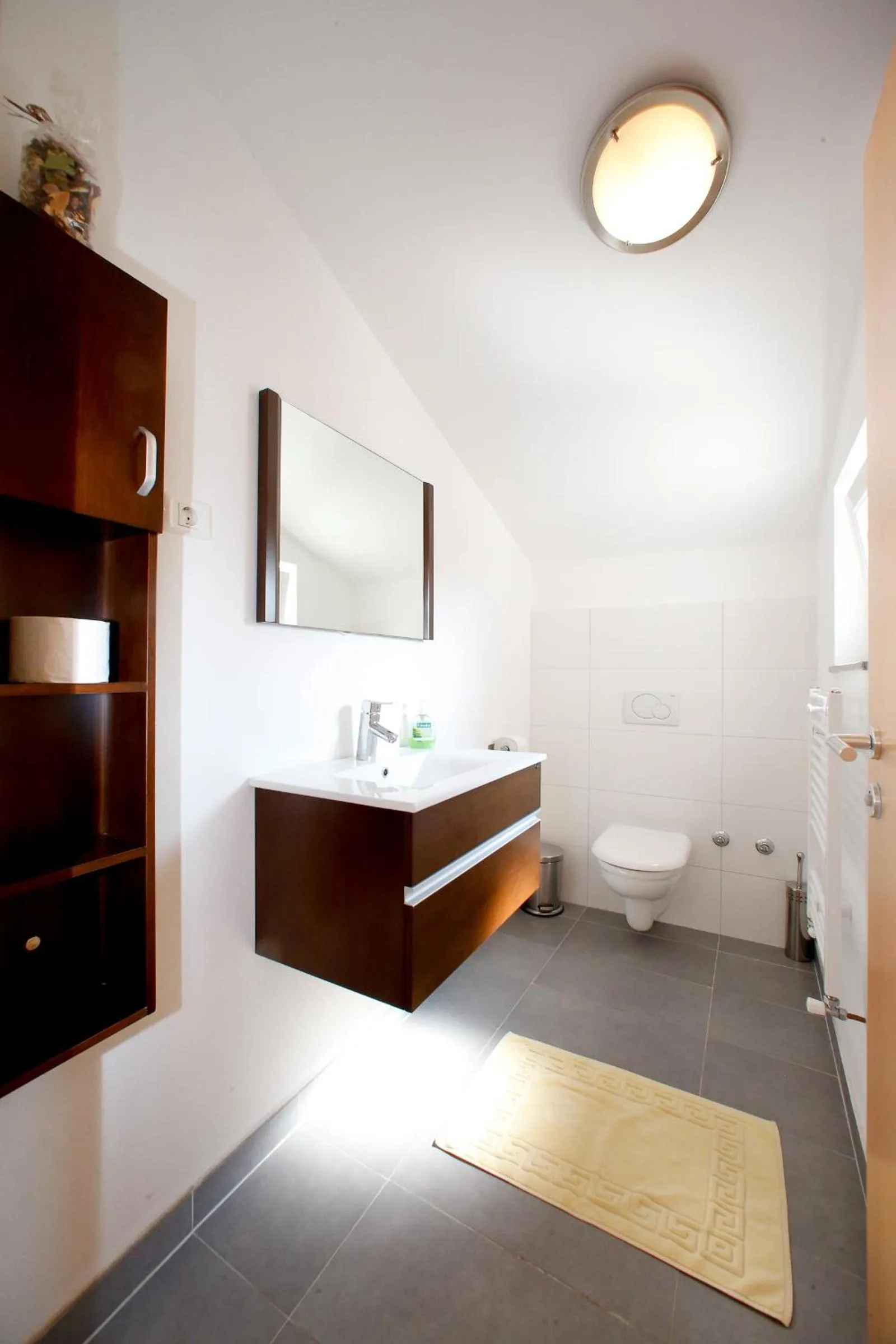 Bathroom in BC Better Choice Apartments with Central Heating