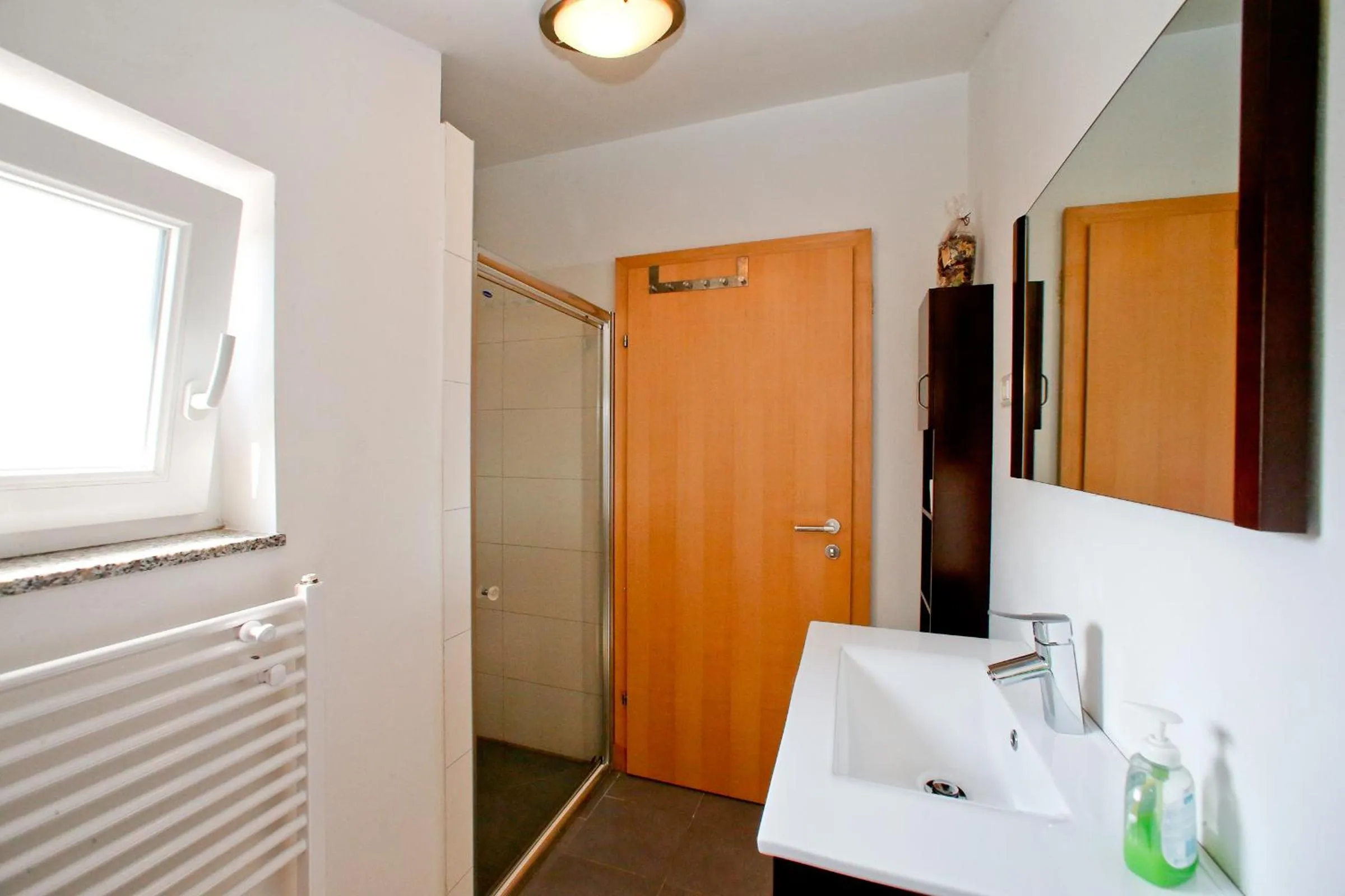 Bathroom in BC Better Choice Apartments with Central Heating