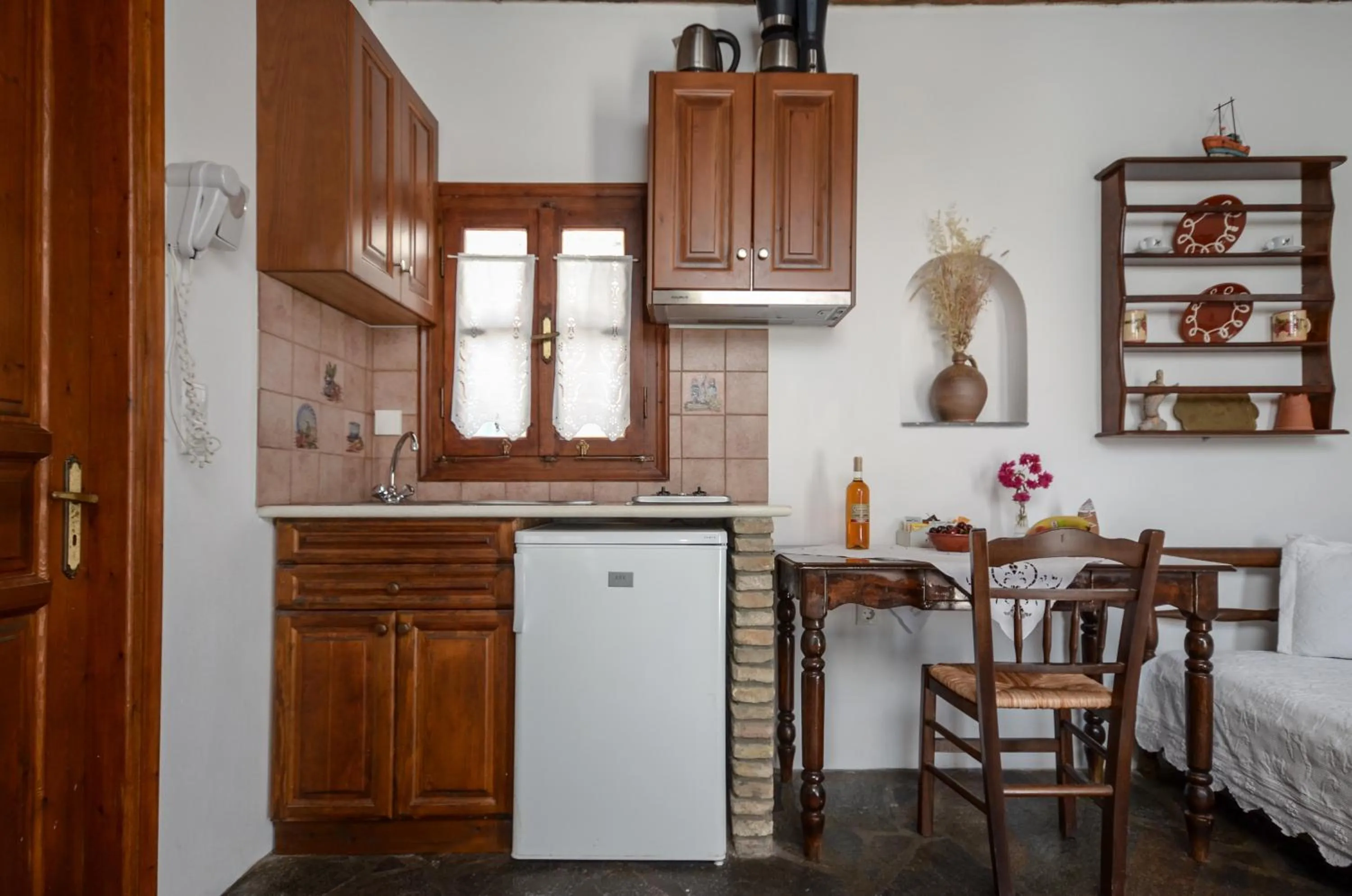 Kitchen or kitchenette in Naxos Filoxenia Hotel