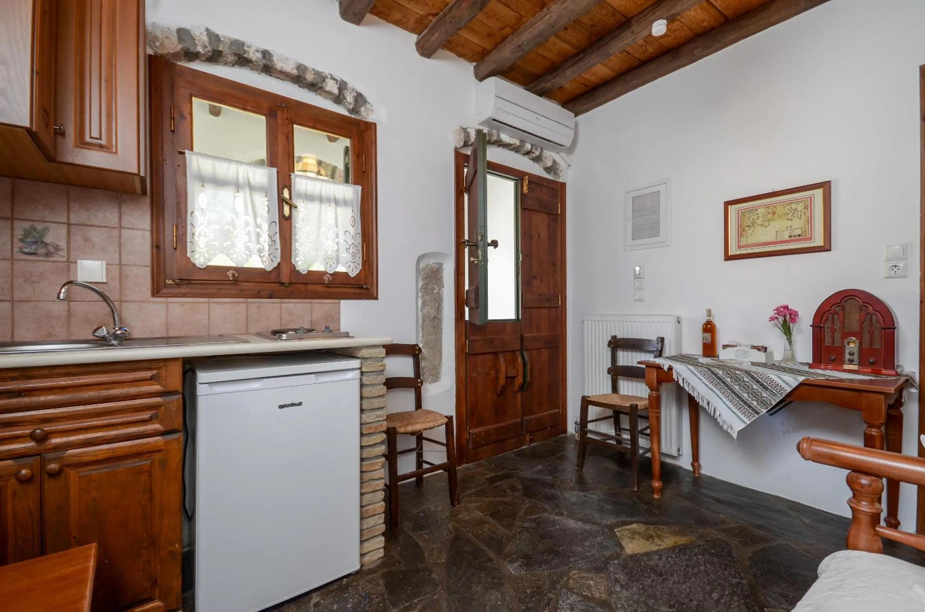 Kitchen or kitchenette in Naxos Filoxenia Hotel