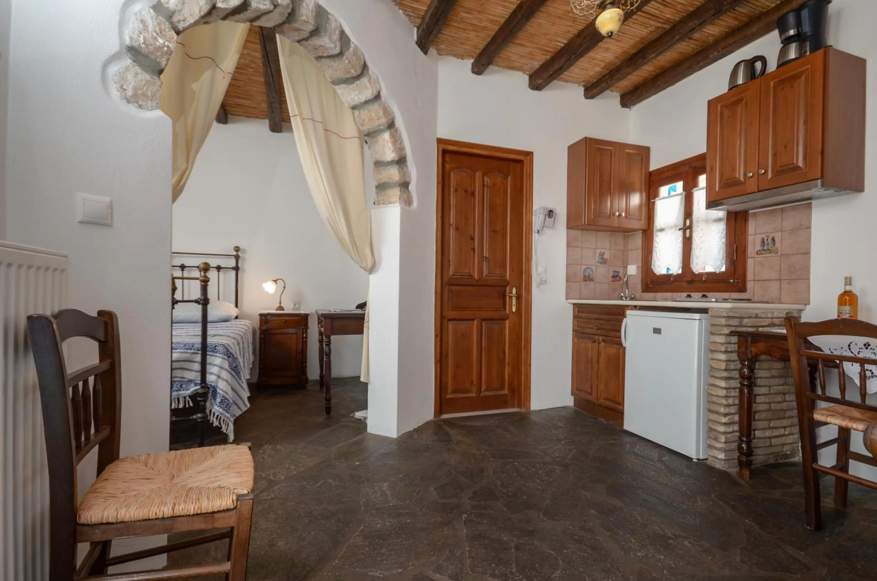 Kitchen or kitchenette in Naxos Filoxenia Hotel