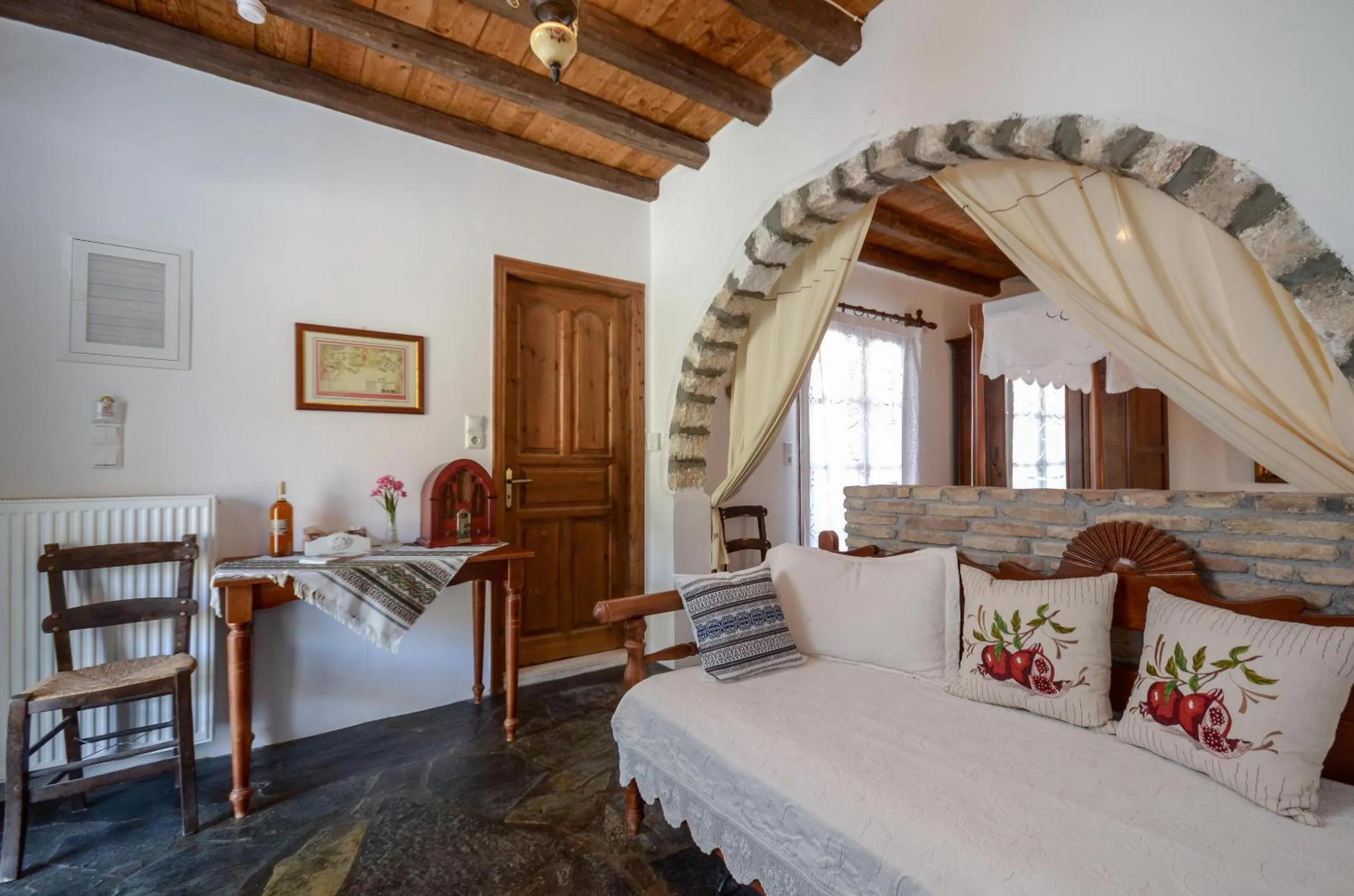 Seating area, Bed in Naxos Filoxenia Hotel