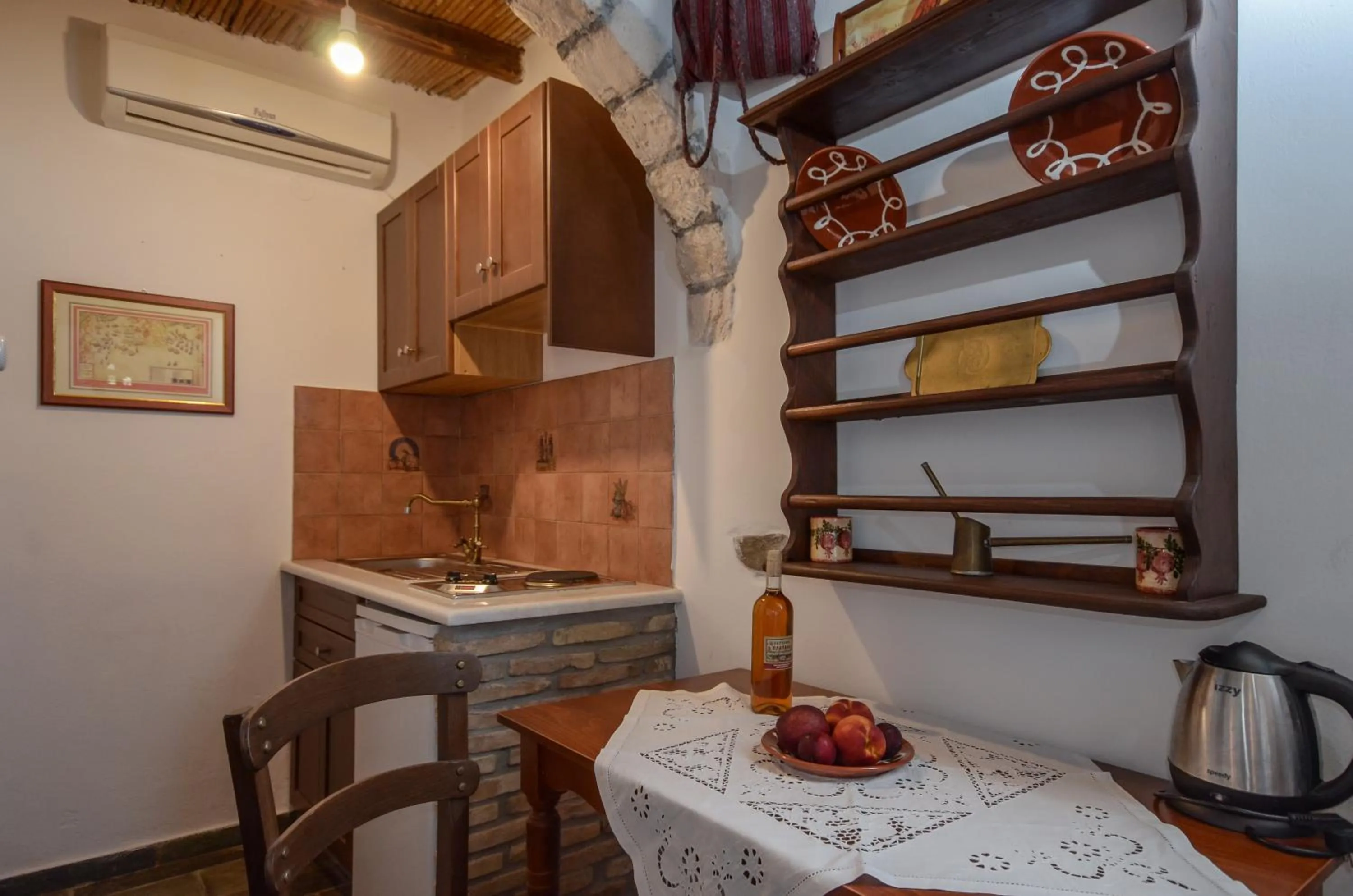 Kitchen or kitchenette in Naxos Filoxenia Hotel