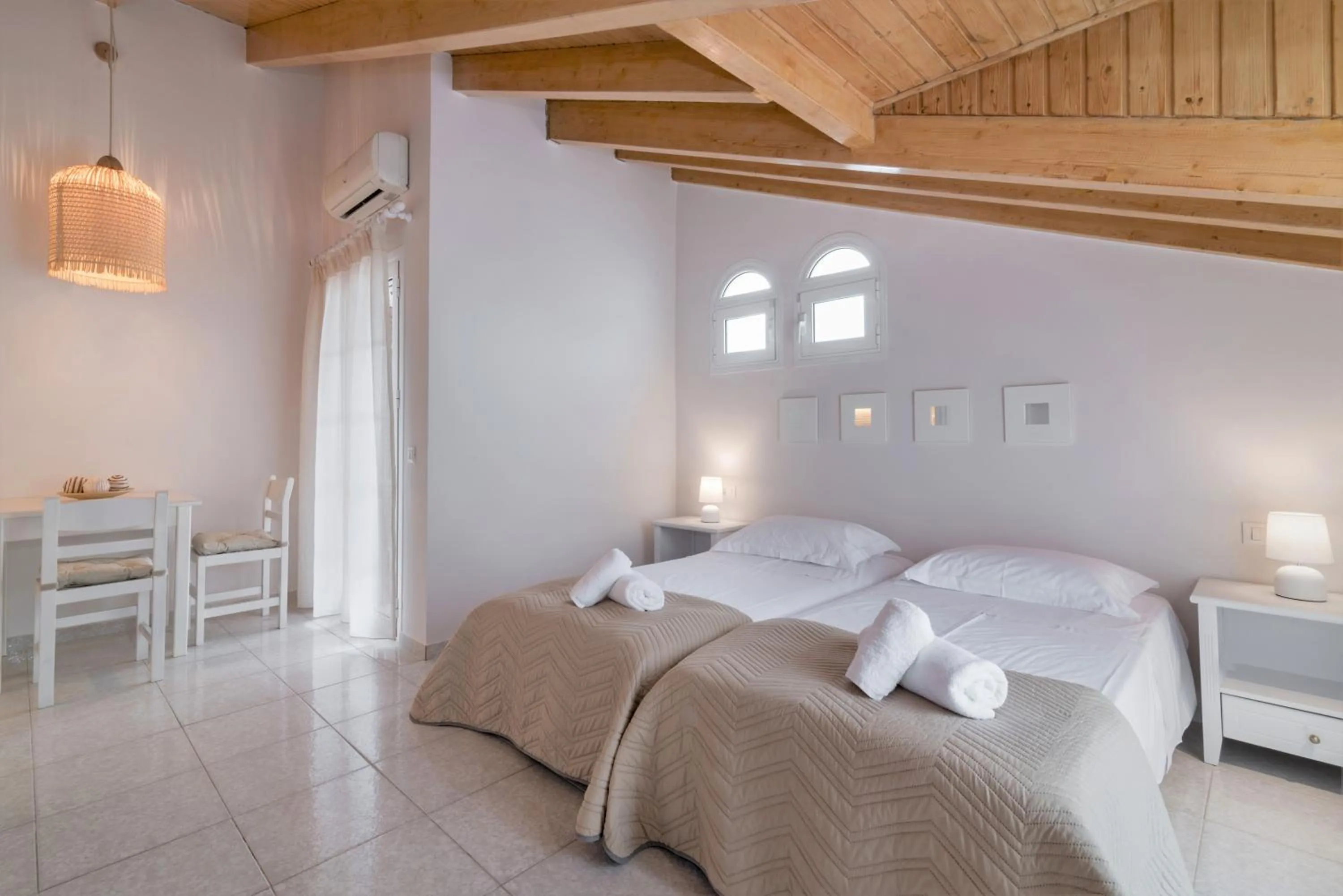 Bed in Edelweiss Hotel