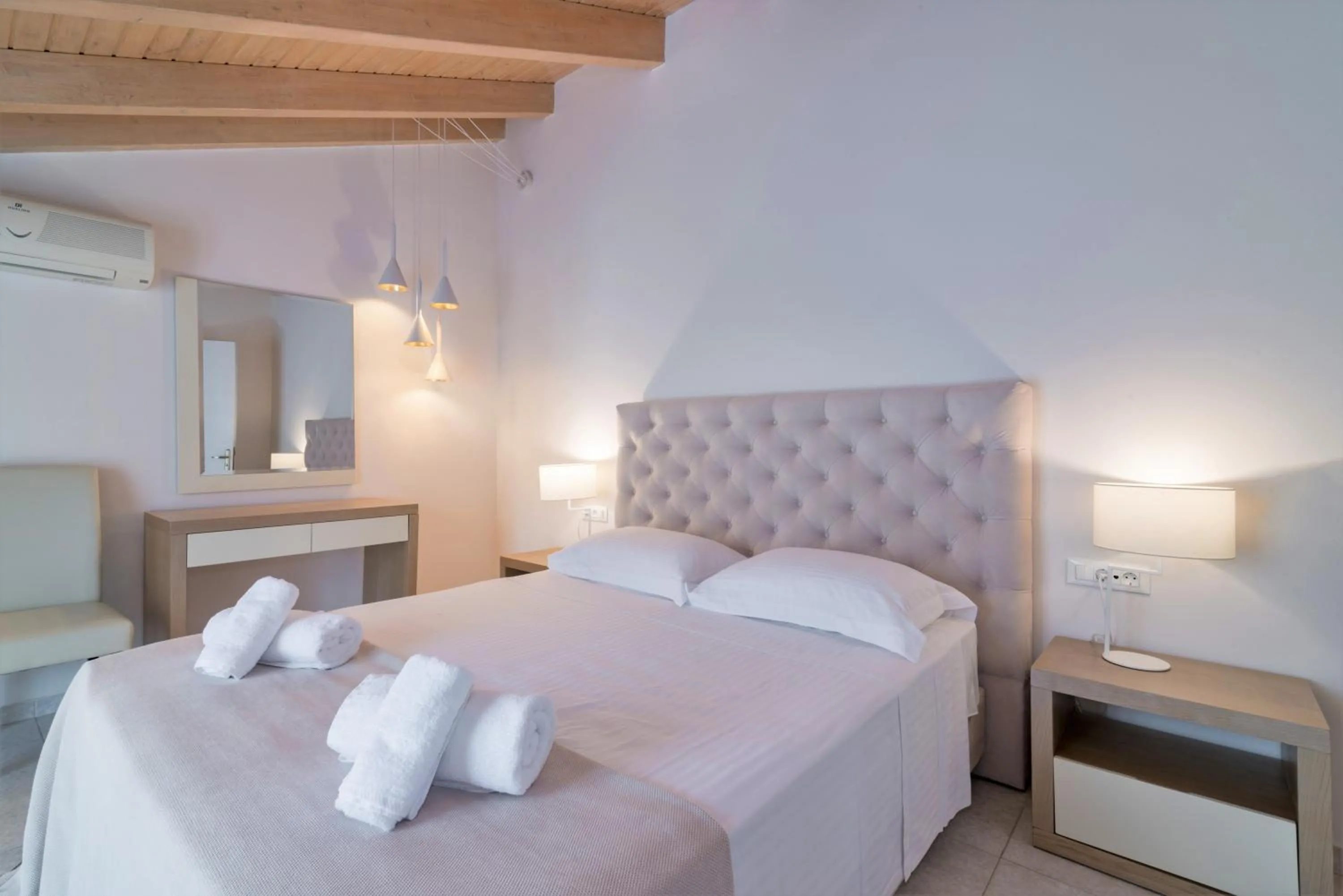 Bed in Edelweiss Hotel