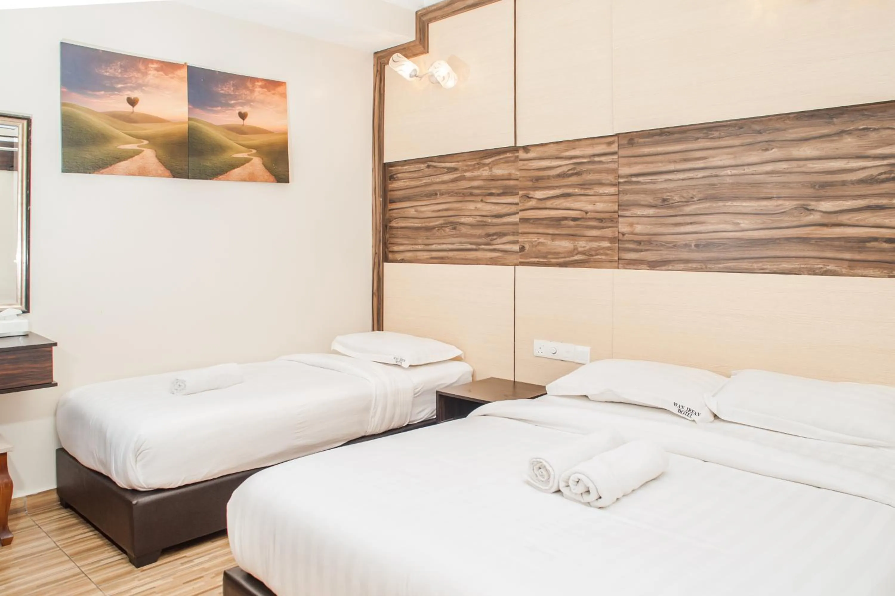 Bed in Wan Alyasa Hotel