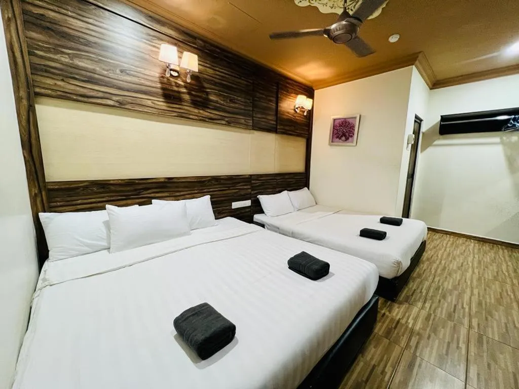 Bed in Wan Alyasa Hotel